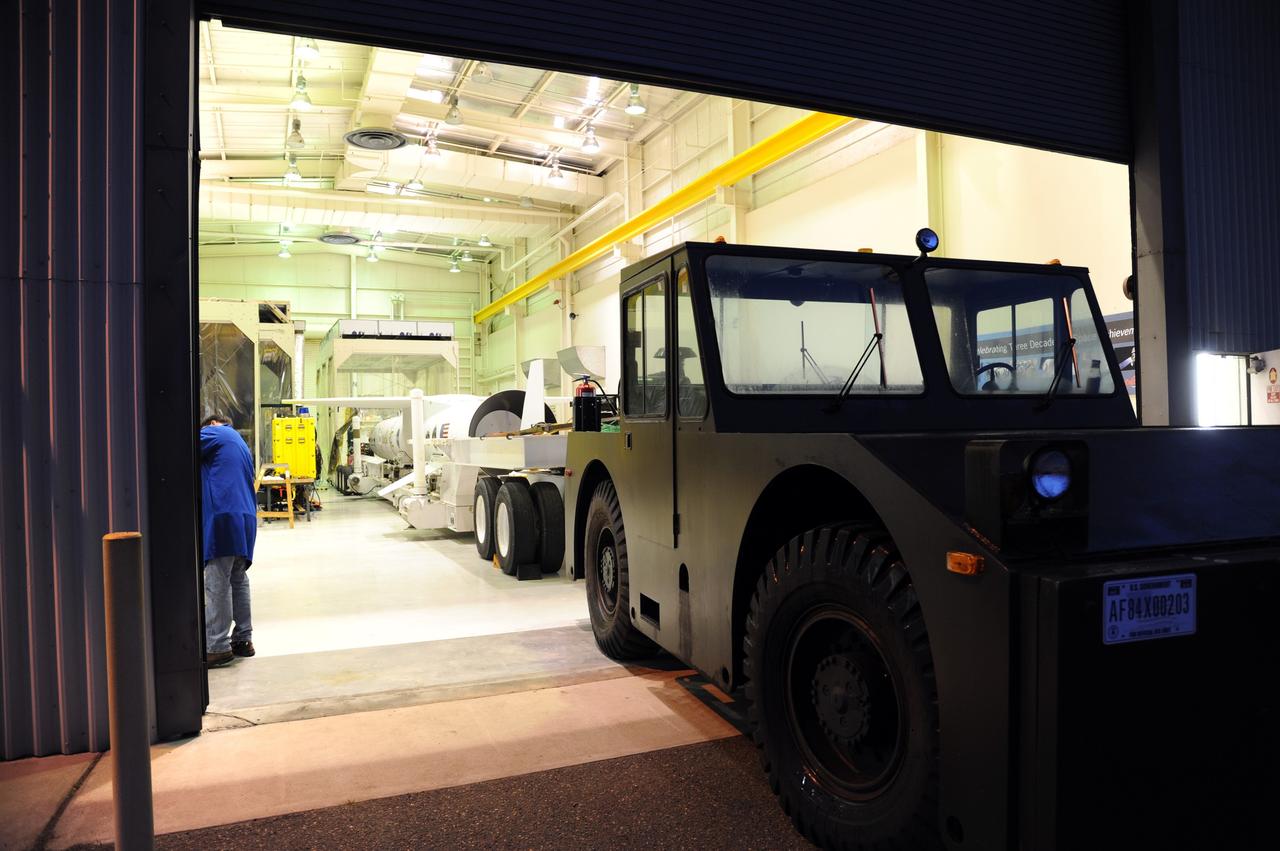 VANDENBERG AIR FORCE BASE, Calif. – Preparations are under way in Orbital Sciences’ hangar on Vandenberg Air Force Base in California to transport NASA’s Nuclear Spectroscopic Telescope Array, or NuSTAR, mated to Orbital’s Pegasus XL rocket, to the “hot pad,” located on the ramp adjacent to the runway.  At the hot pad, the rocket will be attached beneath Orbital’s L-1011 carrier aircraft.    The duo will be flown from Vandenberg to the U.S. Army's Ronald Reagan Ballistic Missile Defense Test Site on Kwajalein Atoll, part of the Marshall Islands in the Pacific Ocean.  The Pegasus and its NuSTAR payload will be launched June 13 from the carrier aircraft 117 nautical miles south of Kwajalein at latitude 6.75 degrees north of the equator.  The high-energy X-ray telescope will conduct a census of black holes, map radioactive material in young supernovae remnants, and study the origins of cosmic rays and the extreme physics around collapsed stars. For more information, visit http://www.nasa.gov/nustar.  Photo credit: NASA/Chris Wiant, VAFB