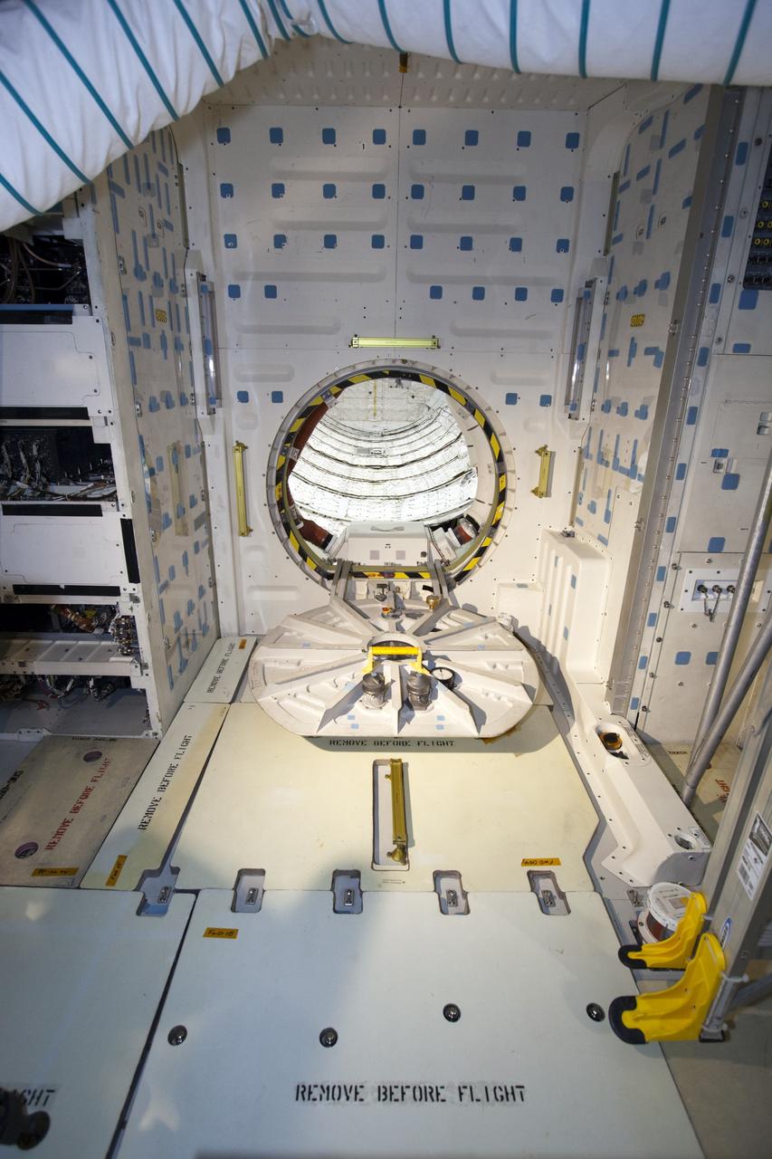 CAPE CANAVERAL, Fla. – In Orbiter Processing Facility-2 at NASA’s Kennedy Space Center in Florida, the area surrounding space shuttle Endeavour’s airlock is cleared of all tools and equipment before its hatch is closed for the final time during processing for the shuttle’s retirement. Endeavour is being prepared for public display at the California Science Center in Los Angeles. Its ferry flight to California is targeted for mid-September. Endeavour, designated OV-105, was the last space shuttle added to NASA’s orbiter fleet. Over the course of its 19-year career, Endeavour spent 299 days in space during 25 missions. For more information, visit http://www.nasa.gov/transition. Photo credit: NASA/Dimitri Gerondidakis