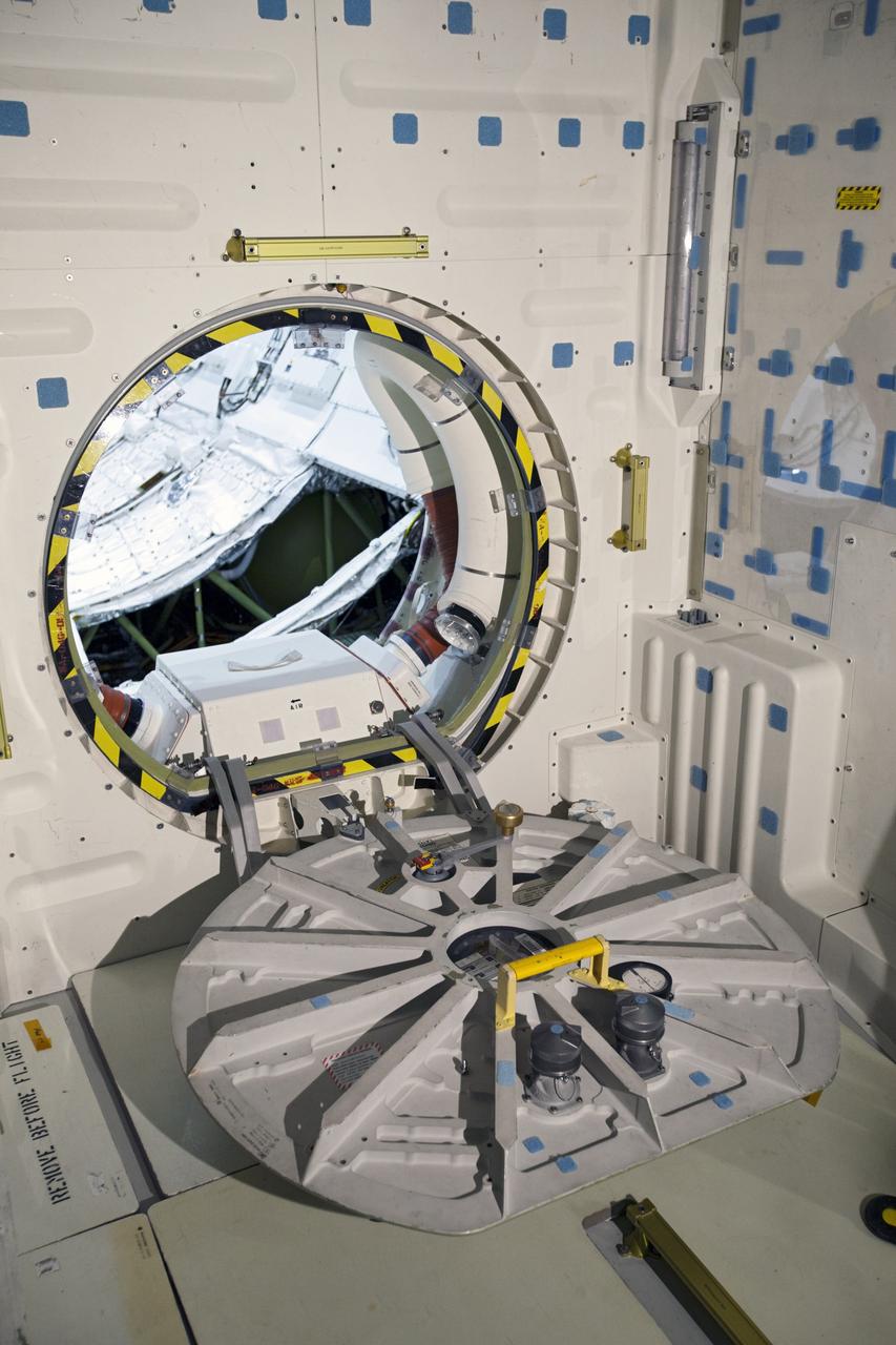 CAPE CANAVERAL, Fla. – In Orbiter Processing Facility-2 at NASA’s Kennedy Space Center in Florida, space shuttle Endeavour’s airlock has been reinstalled and preparations are under way for its hatch to be closed for the final time during processing for the shuttle’s retirement. Endeavour is being prepared for public display at the California Science Center in Los Angeles. Its ferry flight to California is targeted for mid-September. Endeavour, designated OV-105, was the last space shuttle added to NASA’s orbiter fleet. Over the course of its 19-year career, Endeavour spent 299 days in space during 25 missions. For more information, visit http://www.nasa.gov/transition. Photo credit: NASA/Dimitri Gerondidakis