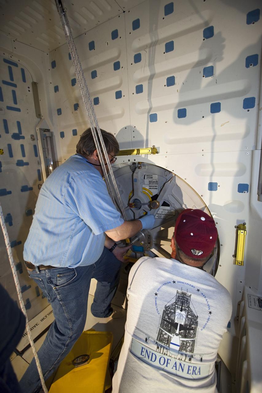CAPE CANAVERAL, Fla. – In Orbiter Processing Facility-2 at NASA’s Kennedy Space Center in Florida, United Space Alliance technicians close the hatch of space shuttle Endeavour’s airlock for the final time during processing for the shuttle’s retirement. Endeavour is being prepared for public display at the California Science Center in Los Angeles. Its ferry flight to California is targeted for mid-September. Endeavour, designated OV-105, was the last space shuttle added to NASA’s orbiter fleet. Over the course of its 19-year career, Endeavour spent 299 days in space during 25 missions. For more information, visit http://www.nasa.gov/transition. Photo credit: NASA/Dimitri Gerondidakis