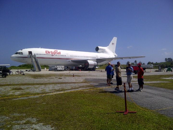 KWAJALEIN ATOLL, Marshall Islands - Orbital Science Corp.'s L-1011 aircraft "Stargazer" stands near the runway on Kwajalein Atoll with the company's Pegasus rocket slung underneath. The Pegasus was used to launch NASA's NuSTAR spacecraft mission on June 13, 2012, from the Pacific island chain. Photo credit: NASA