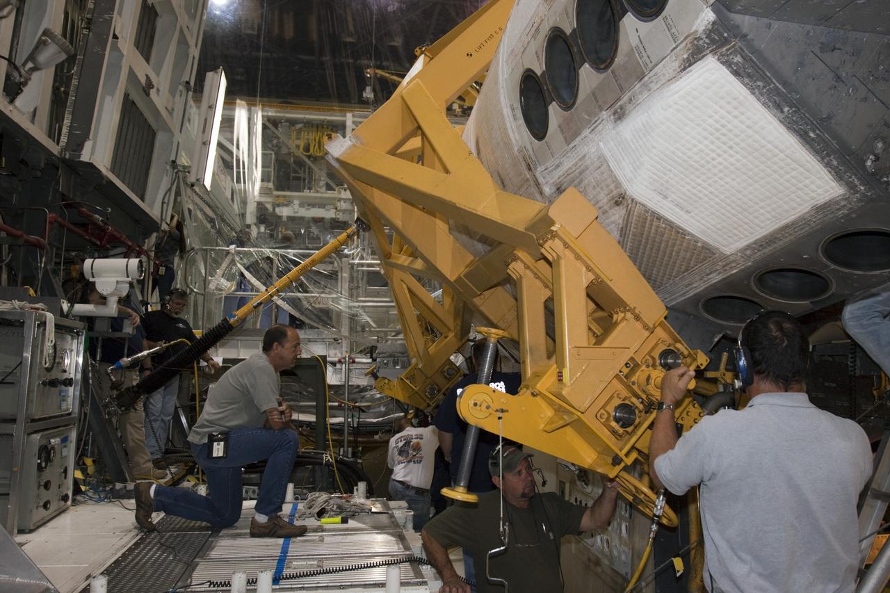 CAPE CANAVERAL, Fla. – In Orbiter Processing Facility-1 at NASA’s Kennedy Space Center in Florida, reinstallation of the left orbital maneuvering system, or OMS, pod on space shuttle Atlantis is under way. The orbital maneuvering system provided the shuttle with thrust for orbit insertion, rendezvous and deorbit, and could provide up to 1,000 pounds of propellant to the aft reaction control system. The OMS is housed in two independent pods located on each side of the shuttle's aft fuselage. Each pod contains one OMS engine and the hardware needed to pressurize, store and distribute the propellants to perform the velocity maneuvers. Atlantis’ OMS pods were removed and sent to White Sands Test Facility in New Mexico to be cleaned of residual toxic propellant. The work is part of the Space Shuttle Program’s transition and retirement processing of the shuttle fleet. A groundbreaking was held Jan. 18 for Atlantis' future home, a 65,000-square-foot exhibit hall in Shuttle Plaza at the Kennedy Space Center Visitor Complex. Atlantis is scheduled to roll over to the visitor complex in November in preparation for the exhibit’s grand opening in July 2013. For more information, visit http://www.nasa.gov/transition. Photo credit: NASA/Ben Smegelsky