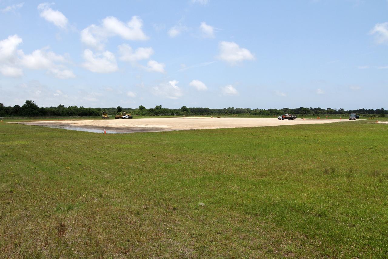 CAPE CANAVERAL, Fla. – The foundation of the hazard field for NASA’s Project Morpheus lander takes shape near the Shuttle Landing Facility, or SLF, at NASA’s Kennedy Space Center in Florida. Testing of the prototype lander has been ongoing at NASA's Johnson Space Center in Houston in preparation for its first free flight. The SLF will provide the lander with the kind of field necessary for realistic testing, complete with rocks, craters and hazards to avoid. Morpheus utilizes an autonomous landing and hazard avoidance technology, or ALHAT, payload that will allow it to navigate to clear landing sites amidst rocks, craters and other hazards during its descent. Project Morpheus is one of 20 small projects comprising the Advanced Exploration Systems, or AES, program in NASA's Human Exploration and Operations Mission Directorate. AES projects pioneer new approaches for rapidly developing prototype systems, demonstrating key capabilities and validating operational concepts for future human missions beyond Earth orbit. For more information on Project Morpheus, visit http://www.nasa.gov/centers/johnson/exploration/morpheus/index.html. Photo credit: NASA/Kim Shiflett