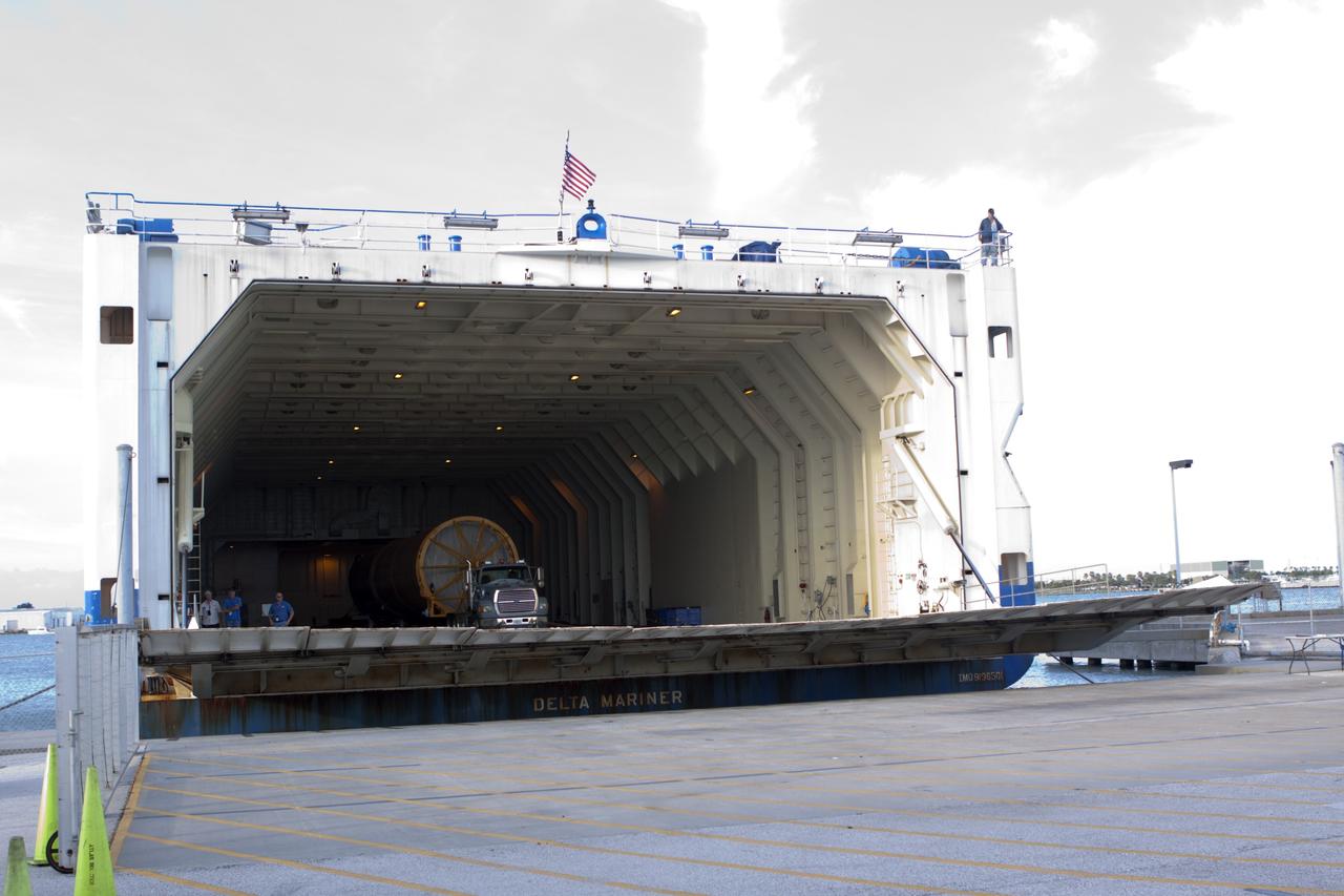 CAPE CANAVERAL, Fla. – The Atlas V first stage booster for NASA's Radiation Belt Storm Probes mission arrives at Port Canaveral in Florida aboard United Launch Alliance's Delta Mariner barge.    The Radiation Belt Storm Probes, or RBSP, mission will help us understand the sun’s influence on Earth and near-Earth space by studying the Earth’s radiation belts on various scales of space and time. For more information, visit http://www.nasa.gov/rbsp. Photo credit: NASA/Jim Grossmann
