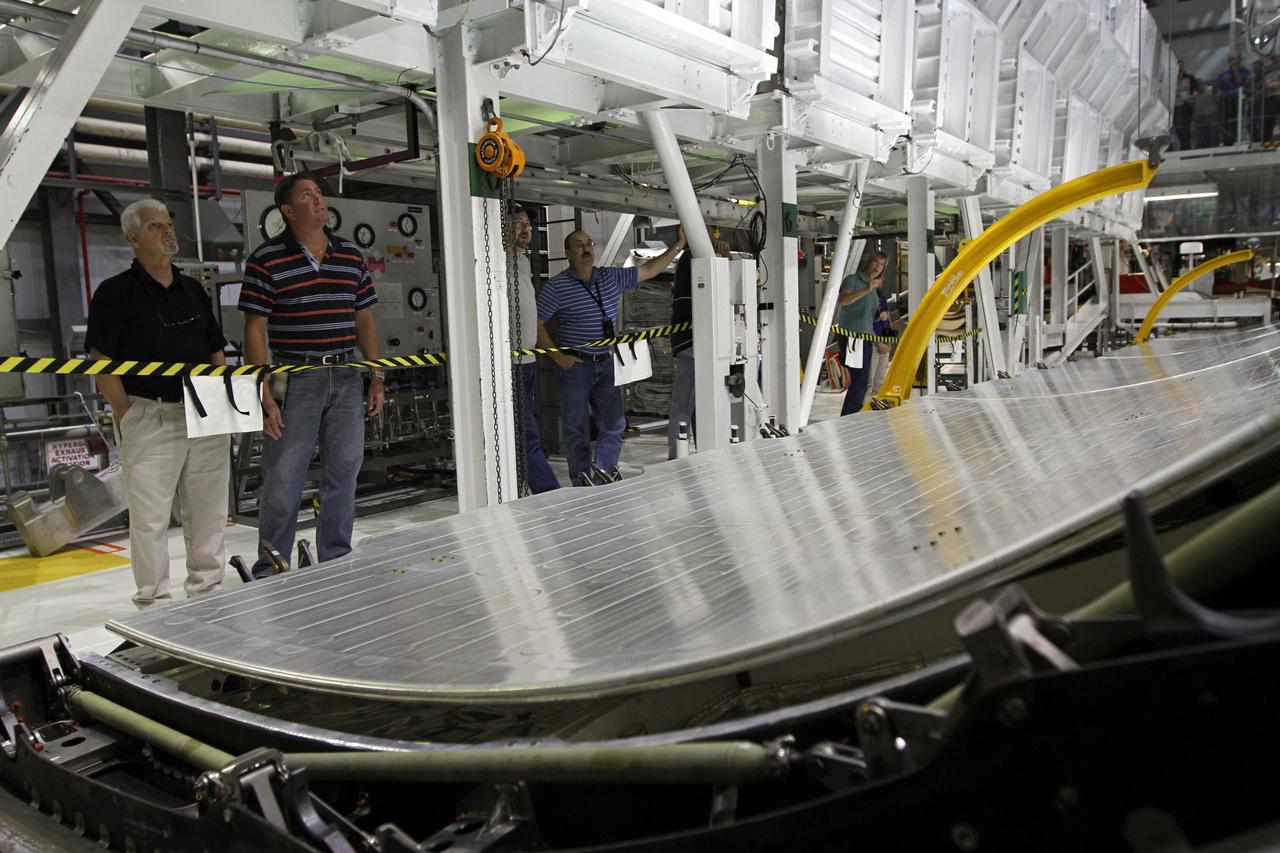 CAPE CANAVERAL, Fla. – Inside Orbiter Processing Facility-2 at NASA’s Kennedy Space Center in Florida, United Space Alliance technicians monitor the progress of space shuttle Endeavour’s payload bay doors as they are closed for the final time. The work is part of Transition and Retirement of the remaining space shuttles, Endeavour and Atlantis. Endeavour is being prepared for public display at the California Science Center in Los Angeles. Its ferry flight to California is targeted for mid-September. Endeavour was the last space shuttle added to NASA’s orbiter fleet. Over the course of its 19-year career, Endeavour spent 299 days in space during 25 missions. For more information, visit http://www.nasa.gov/shuttle. Photo credit: NASA/Kim Shiflett