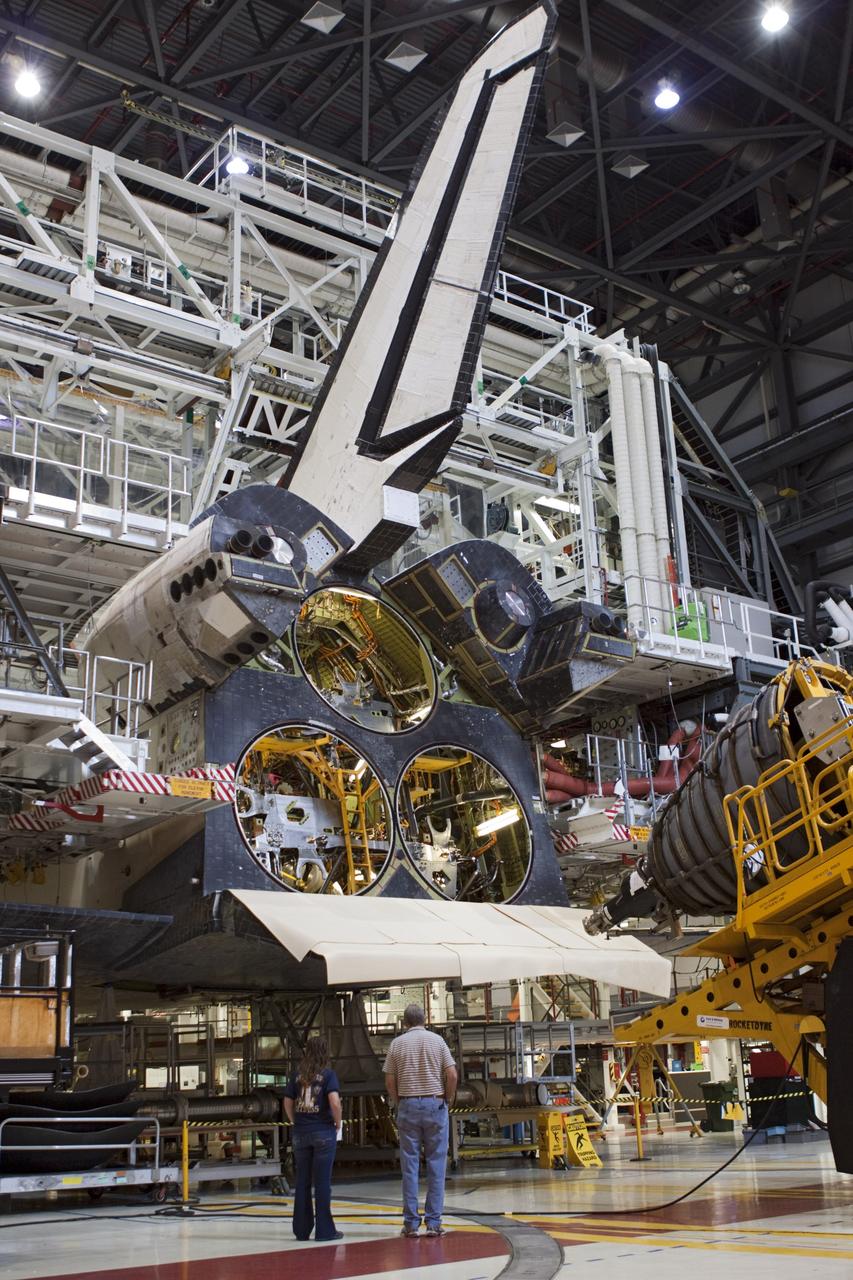 CAPE CANAVERAL, Fla. – In Orbiter Processing Facility-1 at NASA’s Kennedy Space Center in Florida, a technician moves the Hyster forklift carrying replica shuttle main engine RSME number 1 toward space shuttle Atlantis. Three RSMEs will be installed on Atlantis. The work is part of the Space Shuttle Program’s transition and retirement processing of the space shuttle fleet. A groundbreaking was held Jan. 18 for Atlantis’ future home, a 65,000-square-foot exhibit hall in Shuttle Plaza at the Kennedy Space Center Visitor Complex. Atlantis is scheduled to roll over to the visitor complex in November in preparation for the exhibit’s grand opening in July 2013. For more information, visit http://www.nasa.gov/transition. Photo credit: NASA/Jim Grossmann