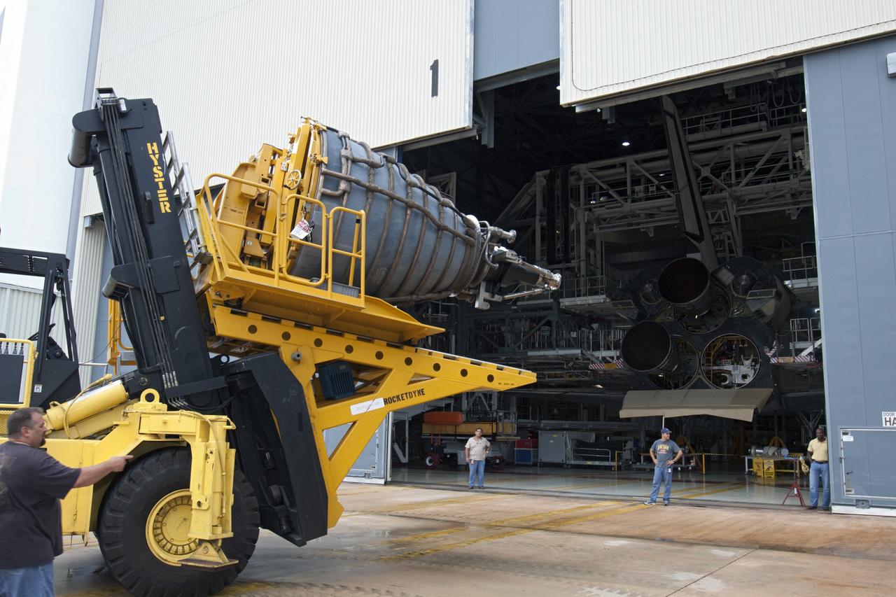 CAPE CANAVERAL, Fla. - At NASA’s Kennedy Space Center in Florida, technicians use the Hyster forklift to deliver replica shuttle main engine RSME number 2 to Orbiter Processing Facility Bay 1 for installation on space shuttle Atlantis. Three RSMEs were installed on Atlantis. The replicas were built in the Pratt & Whitney Rocketdyne engine shop at KSC to replace the space shuttle main engines SSMEs which will be placed in storage to support NASA's Space Launch System currently under development. The RSME installation is part of the Space Shuttle Program’s transition and retirement processing of the space shuttle fleet. A groundbreaking was held Jan. 18, 2012 for Atlantis’ future home, a 65,000-square-foot exhibit hall in Shuttle Plaza at the Kennedy Space Center Visitor Complex. Atlantis is scheduled to roll over to the visitor complex during November in preparation for the exhibit’s grand opening in July 2013. For more information, visit http://www.nasa.gov/transition. Photo credit: NASA/Glenn Benson
