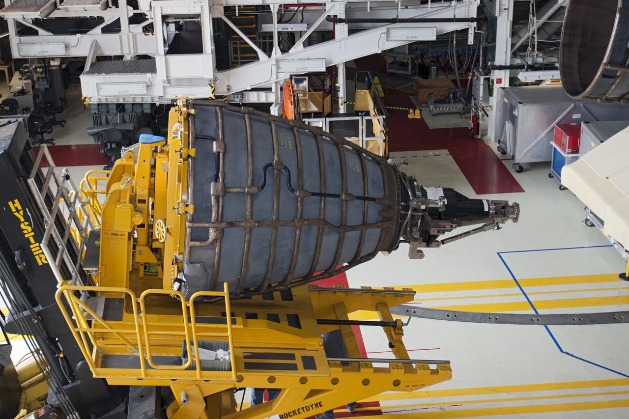 CAPE CANAVERAL, Fla. - In Orbiter Processing Facility Bay 1 at NASA’s Kennedy Space Center in Florida, technicians use the Hyster forklift to position replica shuttle main engine RSME number 2 for installation on the space shuttle Atlantis. Three RSMEs were installed on Atlantis. The replicas were built in the Pratt & Whitney Rocketdyne engine shop at KSC to replace the space shuttle main engines SSMEs which will be placed in storage to support NASA's Space Launch System currently under development. The RSME installation is part of the Space Shuttle Program’s transition and retirement processing of the space shuttle fleet. A groundbreaking was held Jan. 18, 2012 for Atlantis’ future home, a 65,000-square-foot exhibit hall in Shuttle Plaza at the Kennedy Space Center Visitor Complex. Atlantis is scheduled to roll over to the visitor complex during November in preparation for the exhibit’s grand opening in July 2013. For more information, visit http://www.nasa.gov/transition. Photo credit: NASA/Glenn Benson