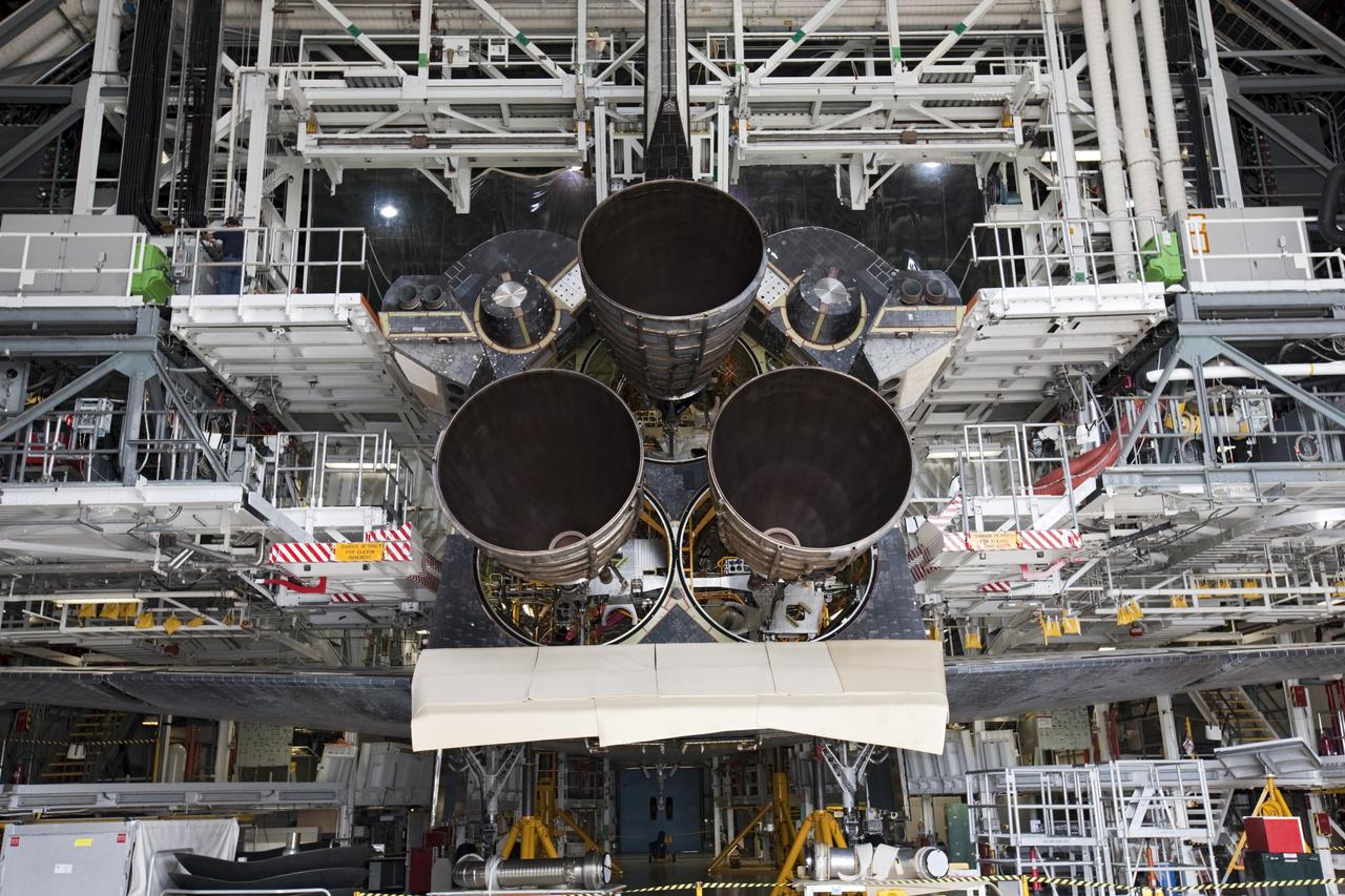 CAPE CANAVERAL, Fla. - In Orbiter Processing Facility Bay 1 at NASA’s Kennedy Space Center in Florida, three replica shuttle main engines RSMEs have been installed on the space shuttle Atlantis. The orbiter is surrounded by work platforms allowing access to all areas of the spacecraft. Three RSMEs were installed on Atlantis. The replicas were built in the Pratt & Whitney Rocketdyne engine shop at KSC to replace the space shuttle main engines SSMEs which will be placed in storage to support NASA's Space Launch System currently under development. The RSME installation is part of the Space Shuttle Program’s transition and retirement processing of the space shuttle fleet. A groundbreaking was held Jan. 18, 2012 for Atlantis’ future home, a 65,000-square-foot exhibit hall in Shuttle Plaza at the Kennedy Space Center Visitor Complex. Atlantis is scheduled to roll over to the visitor complex during November in preparation for the exhibit’s grand opening in July 2013. For more information, visit http://www.nasa.gov/transition. Photo credit: NASA/Glenn Benson