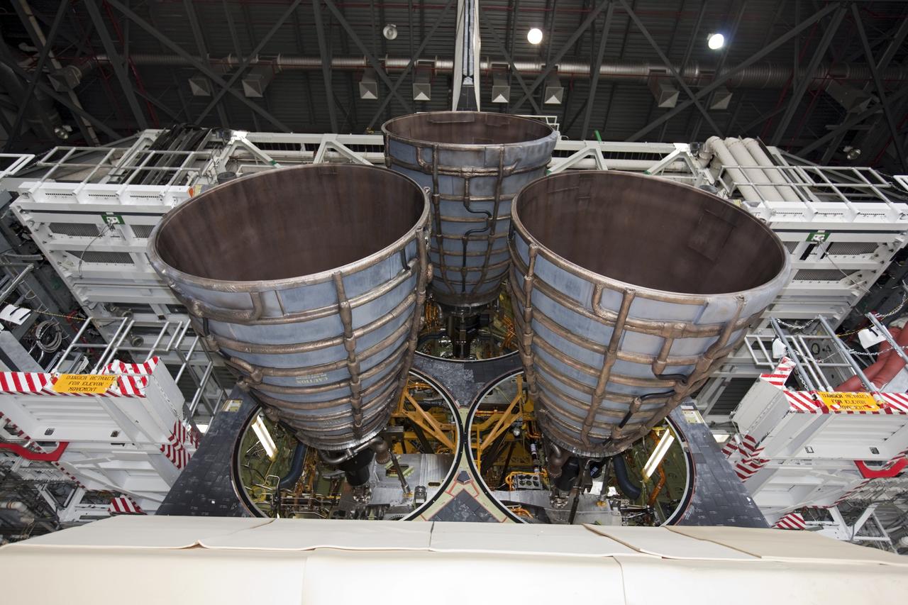 CAPE CANAVERAL, Fla. - In Orbiter Processing Facility Bay 1 at NASA’s Kennedy Space Center in Florida, three replica shuttle main engines RSMEs have been installed on the space shuttle Atlantis.    Three RSMEs were installed on Atlantis. The replicas were built in the Pratt & Whitney Rocketdyne engine shop at KSC to replace the space shuttle main engines SSMEs which will be placed in storage to support NASA's Space Launch System currently under development. The RSME installation is part of the Space Shuttle Program’s transition and retirement processing of the space shuttle fleet. A groundbreaking was held Jan. 18, 2012 for Atlantis’ future home, a 65,000-square-foot exhibit hall in Shuttle Plaza at the Kennedy Space Center Visitor Complex. Atlantis is scheduled to roll over to the visitor complex during November in preparation for the exhibit’s grand opening in July 2013. For more information, visit http://www.nasa.gov/transition. Photo credit: NASA/Glenn Benson