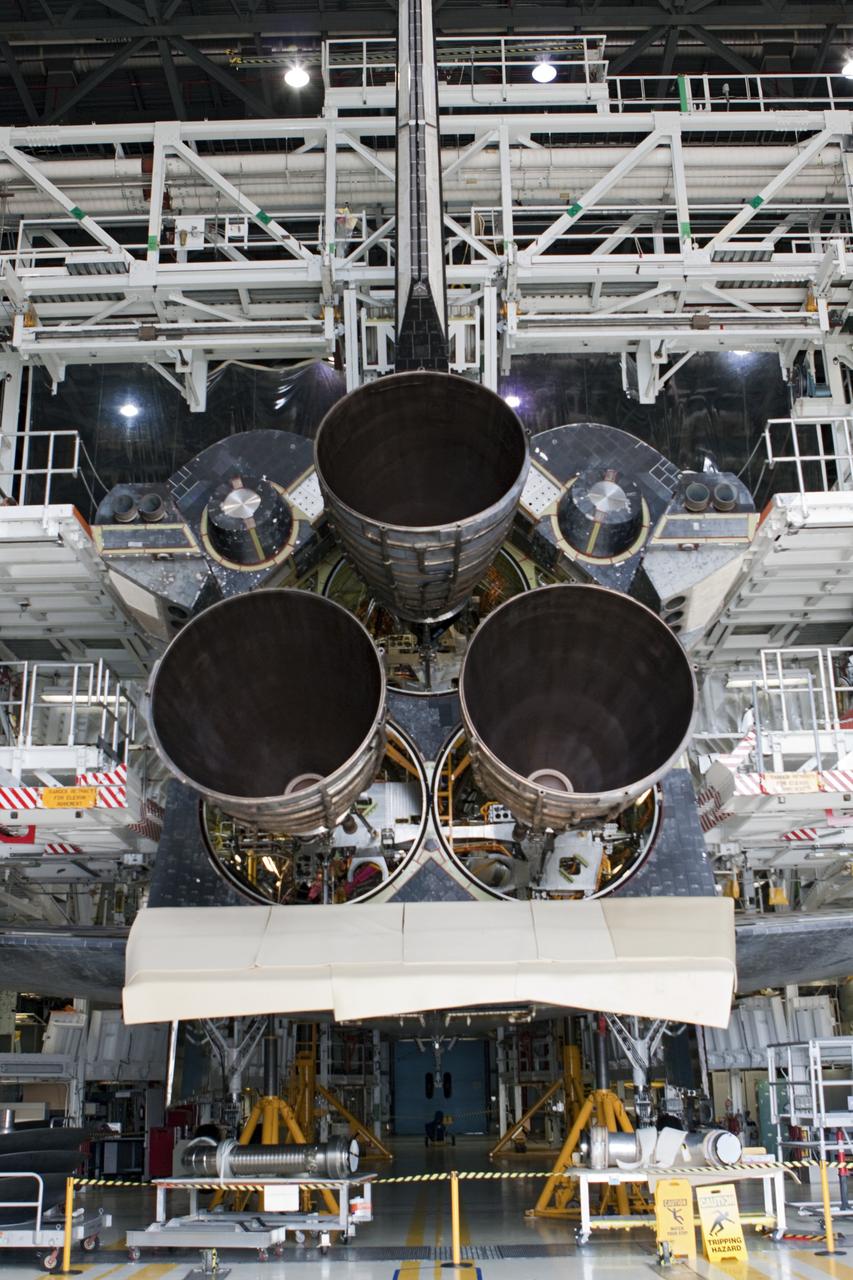CAPE CANAVERAL, Fla. - In Orbiter Processing Facility Bay 1 at NASA’s Kennedy Space Center in Florida, three replica shuttle main engines RSMEs have been installed on the space shuttle Atlantis.    Three RSMEs were installed on Atlantis. The replicas were built in the Pratt & Whitney Rocketdyne engine shop at KSC to replace the space shuttle main engines SSMEs which will be placed in storage to support NASA's Space Launch System currently under development. The RSME installation is part of the Space Shuttle Program’s transition and retirement processing of the space shuttle fleet. A groundbreaking was held Jan. 18, 2012 for Atlantis’ future home, a 65,000-square-foot exhibit hall in Shuttle Plaza at the Kennedy Space Center Visitor Complex. Atlantis is scheduled to roll over to the visitor complex during November in preparation for the exhibit’s grand opening in July 2013. For more information, visit http://www.nasa.gov/transition. Photo credit: NASA/Glenn Benson