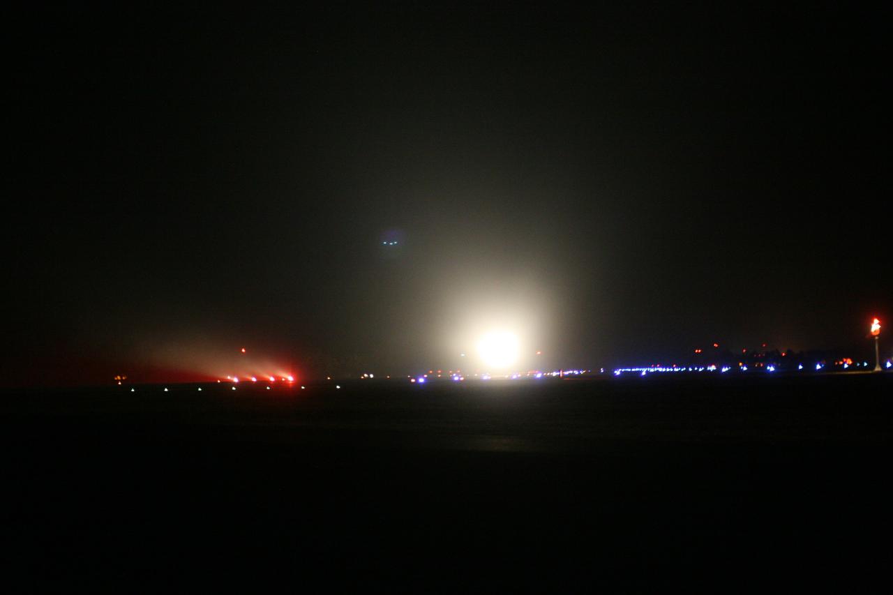 KWAJALEIN ATOLL, Marshall Islands - The lights of Orbital Sciences' L-1011 "Stargazer" aircraft illuminates the night sky as it takes off from the runway at Kwajalein Atoll with the company's Pegasus rocket to launch NASA's Nuclear Spectroscopic Telescope Array, or NuSTAR.    The plane left Kwajalein one hour before launch. At 9:00:35 a.m. PDT 12:00:35 p.m. EDT), June 13, 2012, the rocket dropped with the NuSTAR payload 117 nautical miles south of Kwajalein. NuSTAR will use a unique set of “eyes” to see the highest energy X-ray light from the cosmos to reveal black holes lurking in our Milky Way galaxy, as well as those hidden in the hearts of faraway galaxies. Kwajalein is located in the Marshall Islands chain in the Pacific Ocean and is part of the Reagan Test Site and used for launches of NASA, commercial and military missions. For more information, visit http://www.nasa.gov/nustar.  Photo credit: NASA