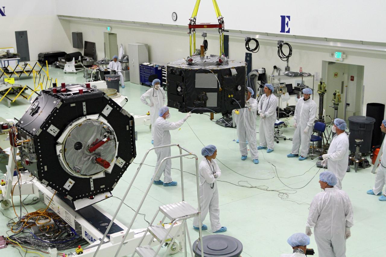 CAPE CANAVERAL, Fla. - Inside the Astrotech payload processing facility near NASA’s Kennedy Space Center in Florida, technicians prepare Radiation Belt Storm Probes, or RBSP, spacecraft A for a spin test. During the spin test, the spacecraft is turned at a rate of 55 rpm to ensure that it is properly balanced.    NASA’s RBSP mission will help us understand the sun’s influence on Earth and near-Earth space by studying the Earth’s radiation belts on various scales of space and time. RBSP will begin its mission of exploration of Earth’s Van Allen radiation belts and the extremes of space weather after its launch aboard a United Launch Alliance Atlas V rocket. Launch is targeted for Aug. 23. For more information, visit http://www.nasa.gov/rbsp. Photo credit: NASA/Charisse Nahser