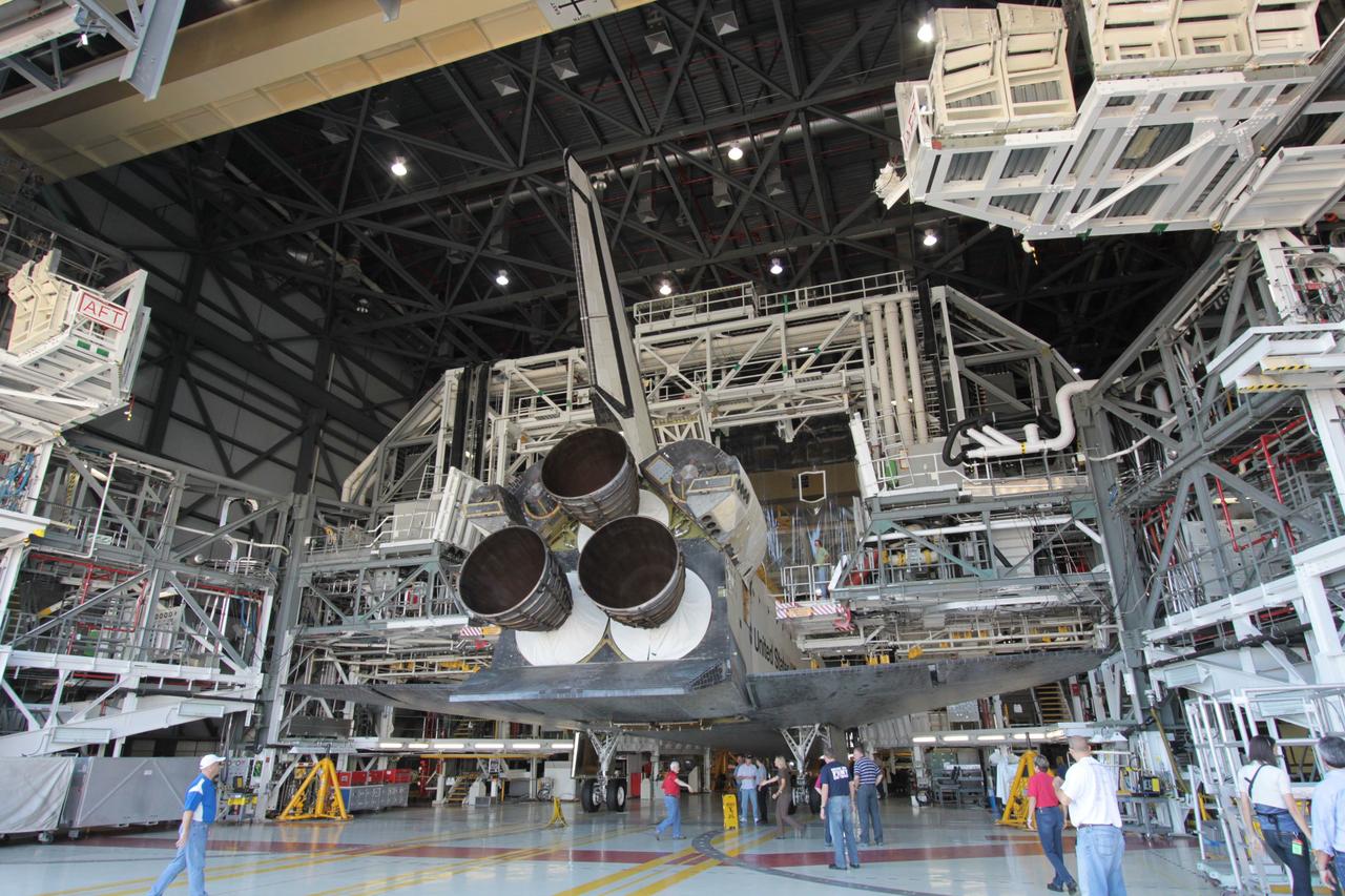 CAPE CANAVERAL, Fla. - At NASA's Kennedy Space Center in Florida, space shuttle Atlantis' aft is visible during preparations to move the spacecraft out of Orbiter Processing Facility-1 and into High Bay 4 of the nearby Vehicle Assembly Building. The work is part of the Space Shuttle Program's transition and retirement processing of the space shuttle fleet. A groundbreaking was held Jan. 18 for Atlantis' future home, a 65,000-square-foot exhibit hall in Shuttle Plaza at the Kennedy Space Center Visitor Complex. Atlantis is scheduled to roll over to the visitor complex in November in preparation for the exhibit's grand opening in July 2013. Photo credit: NASA/Jim Grossmann