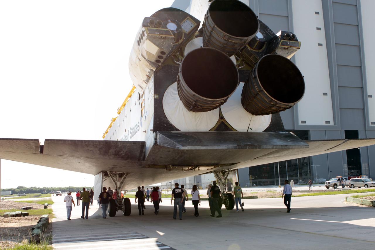 CAPE CANAVERAL, Fla. - Space shuttle Atlantis begins its move from Orbiter Processing Facility Bay 1. The spacecraft is being moved into storage inside High Bay 4 of the nearby Vehicle Assembly Building at NASA's Kennedy Space Center in Florida.    The work is part of the Space Shuttle Program's transition and retirement processing of the space shuttle fleet. A groundbreaking was held Jan. 18 for Atlantis' future home, a 65,000-square-foot exhibit hall in Shuttle Plaza at the Kennedy Space Center Visitor Complex. Atlantis is scheduled to roll over to the visitor complex in November in preparation for the exhibit's grand opening in July 2013. For more information, visit http://www.nasa.gov/transition. Photo credit: NASA/Jim Grossmann