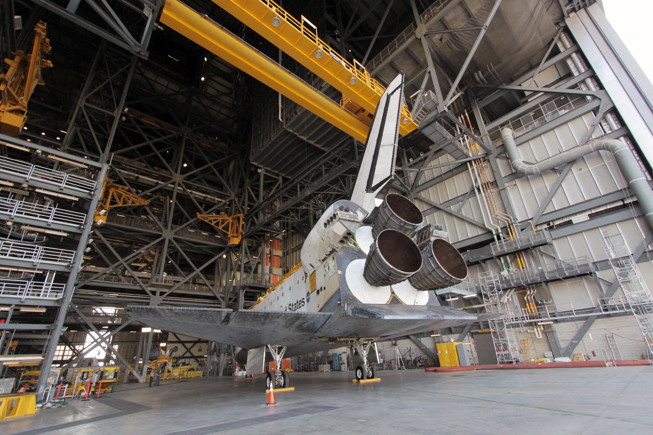 CAPE CANAVERAL, Fla. - Space shuttle Atlantis comes to a stop in High Bay 4 of the Vehicle Assembly Building after a short move from Orbiter Processing Facility-1 at NASA's Kennedy Space Center. The work is part of the Space Shuttle Program's transition and retirement processing of the space shuttle fleet. A groundbreaking was held Jan. 18 for Atlantis' future home, a 65,000-square-foot exhibit hall in Shuttle Plaza at the Kennedy Space Center Visitor Complex. Atlantis is scheduled to roll over to the visitor complex in November in preparation for the exhibit's grand opening in July 2013. Photo credit: NASA/Jim Grossmann