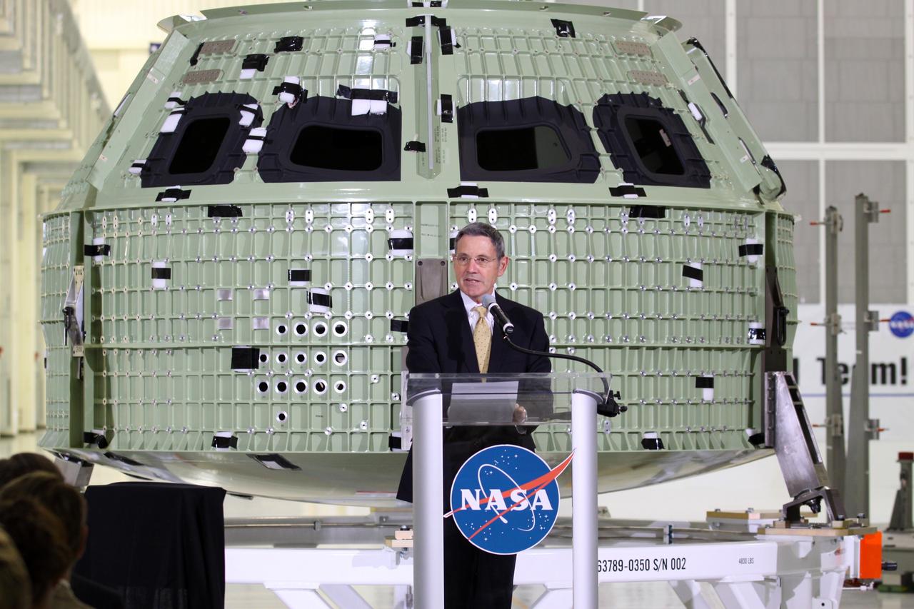 CAPE CANAVERAL, Fla. – NASA Kennedy Space Center Director Robert Cabana addresses the audience assembled in Kennedy Space Center's Operations and Checkout Building high bay for an event marking the arrival of NASA's first space-bound Orion capsule in Florida.    Slated for Exploration Flight Test-1, an uncrewed mission planned for 2014, the capsule will travel farther into space than any human spacecraft has gone in more than 40 years. The capsule was shipped to Kennedy from NASA's Michoud Assembly Facility in New Orleans where the crew module pressure vessel was built. The Orion production team will prepare the module for flight at Kennedy by installing heat-shielding thermal protection systems, avionics and other subsystems. For more information, visit http://www.nasa.gov/orion.  Photo credit: NASA/Kim Shiflett