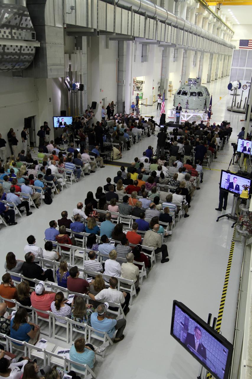 CAPE CANAVERAL, Fla. – NASA Kennedy Space Center Director Robert Cabana addresses the audience assembled in Kennedy's Operations and Checkout Building high bay for an event marking the arrival of NASA's first space-bound Orion capsule in Florida.      Slated for Exploration Flight Test-1, an uncrewed mission planned for 2014, the capsule will travel farther into space than any human spacecraft has gone in more than 40 years. The capsule was shipped to Kennedy from NASA's Michoud Assembly Facility in New Orleans where the crew module pressure vessel was built. The Orion production team will prepare the module for flight at Kennedy by installing heat-shielding thermal protection systems, avionics and other subsystems. For more information, visit http://www.nasa.gov/orion.  Photo credit: NASA/Kim Shiflett
