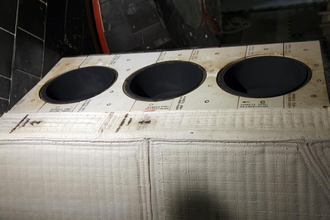 CAPE CANAVERAL, Fla. – Inside Orbiter Processing Facility-2 at NASA’s Kennedy Space Center in Florida, United Space Alliance technicians have completed spray painting simulated orbital maneuvering system, or OMS, pods onto space shuttle Endeavour. The work is part of Transition and Retirement of the remaining space shuttles, Endeavour and Atlantis. Endeavour is being prepared for public display at the California Science Center in Los Angeles. Its ferry flight to California is targeted for mid-September. Endeavour was the last space shuttle added to NASA’s orbiter fleet. Over the course of its 19-year career, Endeavour spent 299 days in space, traveled more than 122 million miles and carried 173 astronauts into space during 25 missions. For more information, visit http://www.nasa.gov/transition. Photo credit: NASA/Frankie Martin