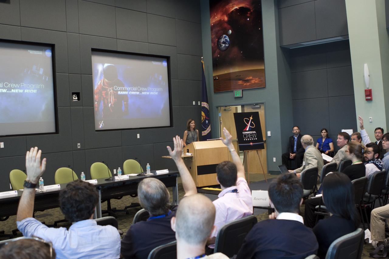 CAPE CANAVERAL, Fla. - Lisa Colloredo, associate program manager for NASA’s Commercial Crew Program, addresses participants of the International Space University in a session in Operations Support Building II at the Kennedy Space Center, Fla., on July 3.    The International Space University is a nine-week intensive course designed for post-graduate university students and professionals during the summer. The program is hosted by a different country each year, providing a unique educational experience for participants from around the world. NASA Kennedy Space Center and the Florida Institute of Technology are co-hosting this year's event which runs from June 4 to Aug. 3. There are about 125 participants representing 31 countries. For more information, visit http://www.isunet.edu Photo credit: NASA/Jim Grossmann