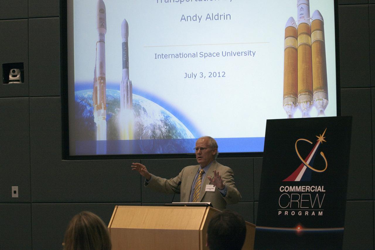 CAPE CANAVERAL, Fla. - Dr. Andrew Aldrin of United Launch Alliance addresses participants of the International Space University in a session in Operations Support Building II at the Kennedy Space Center, Fla., on July 3.      The International Space University is a nine-week intensive course designed for post-graduate university students and professionals during the summer. The program is hosted by a different country each year, providing a unique educational experience for participants from around the world. NASA Kennedy Space Center and the Florida Institute of Technology are co-hosting this year's event which runs from June 4 to Aug. 3. There are about 125 participants representing 31 countries. For more information, visit http://www.isunet.edu Photo credit: NASA/Jim Grossmann