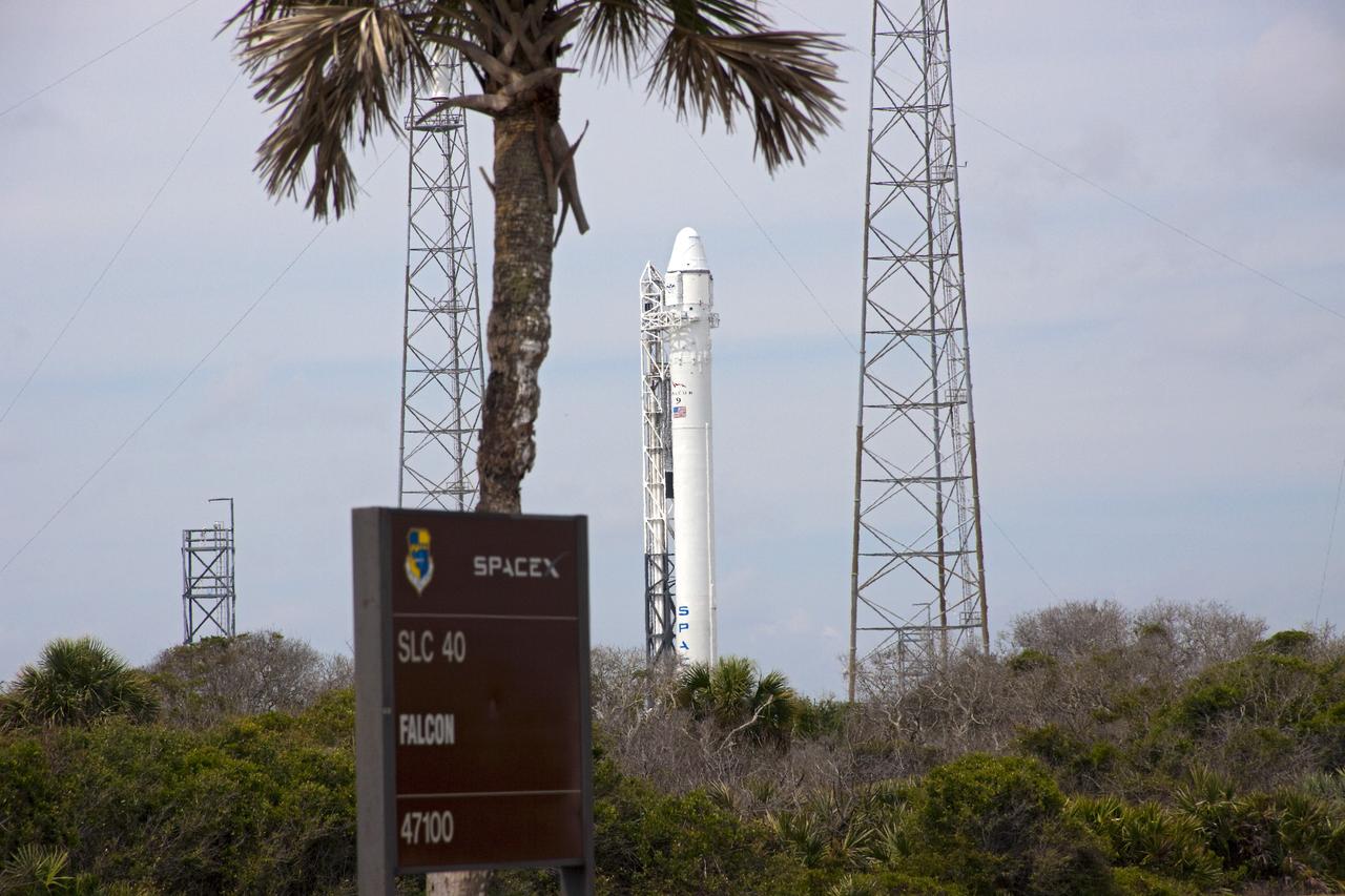 CAPE CANAVERAL, Fla. – The SpaceX Falcon 9 rocket stands at Space Launch Complex-40 on Cape Canaveral Air Force Station in Florida. Liftoff with the SpaceX Dragon capsule aboard is set for 4:55 a.m. EDT on May 19. The launch will be the company's second demonstration test flight for NASA's Commercial Orbital Transportation Services Program, or COTS.    During the flight, the capsule will conduct a series of check-out procedures to test and prove its systems, including rendezvous and berthing with the International Space Station. If the capsule performs as planned, the cargo and experiments it is carrying will be transferred to the station. The cargo includes food, water and provisions for the station’s Expedition crews, such as clothing, batteries and computer equipment. Under COTS, NASA has partnered with two aerospace companies to deliver cargo to the station. For more information, visit http://www.nasa.gov/spacex Photo credit: NASA/Jim Grossmann