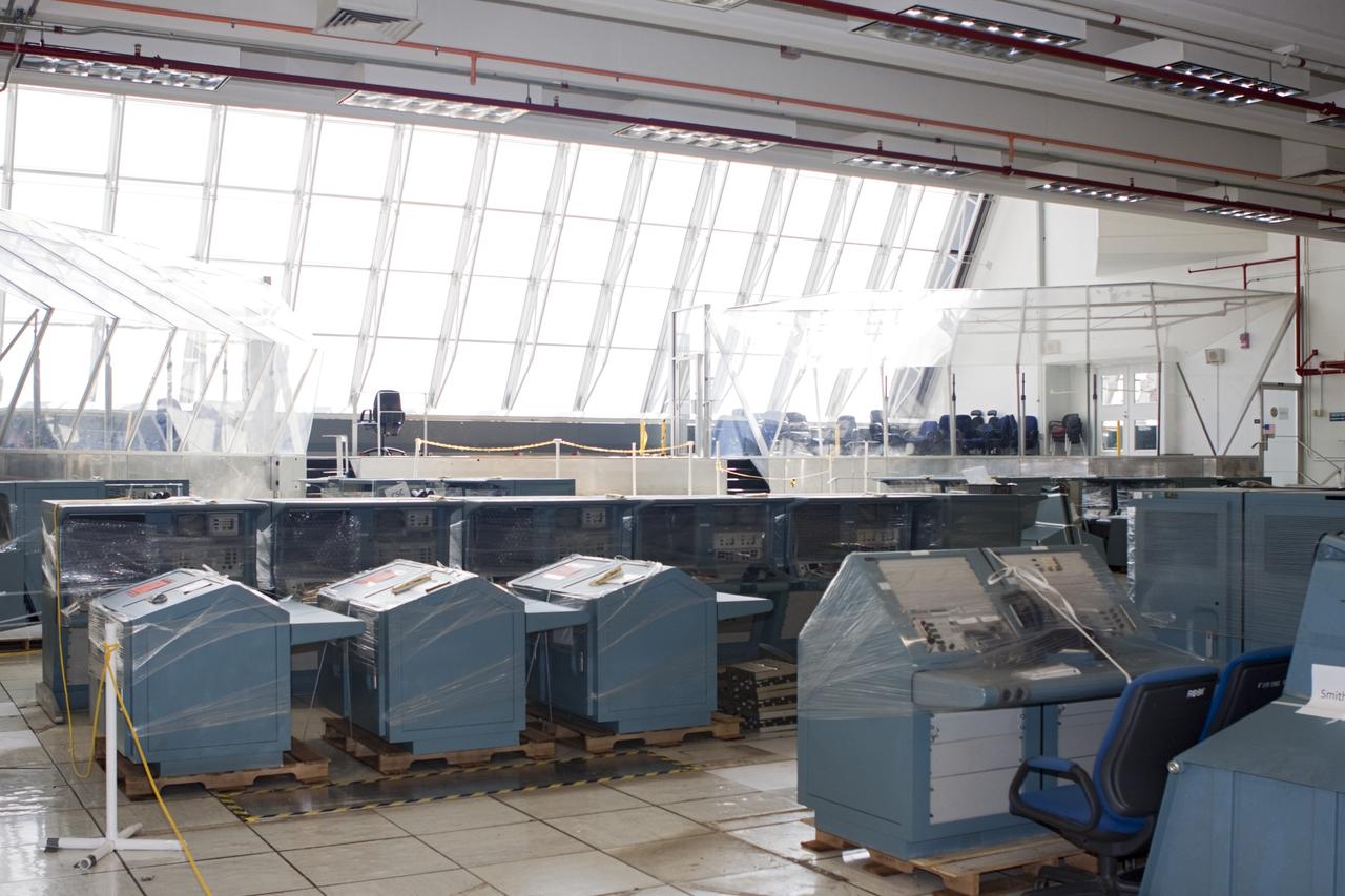 CAPE CANAVERAL, Fla. - In Firing Room 3 of the Launch Control Center at NASA’s Kennedy Space Center in Florida, legacy consoles and monitors are being removed to make way for new systems designed to be flexible so controllers can process and launch multiple types of rockets and spacecraft, whether they are government or commercial models.      KSC’s Launch Complex 39 is transitioning to support multiple users with the Firing Rooms being modified to be more generic in nature for upcoming programs. Photo credit: NASA/Jim Grossmann