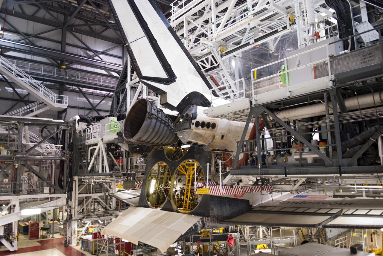 CAPE CANAVERAL, Fla. – In Orbiter Processing Facility Bay 2 at NASA’s Kennedy Space Center in Florida, replica shuttle main engine RSME number 1 has been installed on space shuttle Endeavour. The orbiter is surrounded by work platforms allowing access to all areas of the spacecraft.      The work is part of Transition and Retirement of the remaining space shuttles, Endeavour and Atlantis. Endeavour is being prepared for public display at the California Science Center in Los Angeles. Its ferry flight to California is targeted for mid-September. Endeavour was the last space shuttle added to NASA’s orbiter fleet. Over the course of its 19-year career, Endeavour spent 299 days in space during 25 missions. For more information, visit http://www.nasa.gov/transition Photo credit: NASA/Charisse Nahser