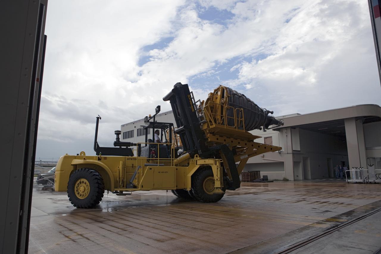 CAPE CANAVERAL, Fla. – At NASA’s Kennedy Space Center in Florida, the Hyster forklift is used to deliver replica shuttle main engine RSME number 3 to Orbiter Processing Facility Bay 2 for installation on space shuttle Endeavour. The work is part of Transition and Retirement of the remaining space shuttles, Endeavour and Atlantis. Endeavour is being prepared for public display at the California Science Center in Los Angeles. Its ferry flight to California is targeted for mid-September. Endeavour was the last space shuttle added to NASA’s orbiter fleet. Over the course of its 19-year career, Endeavour spent 299 days in space during 25 missions. For more information, visit http://www.nasa.gov/transition Photo credit: NASA/ Dimitri Gerondidakis