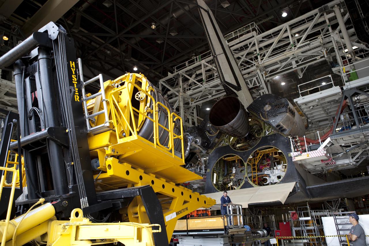 CAPE CANAVERAL, Fla. – At NASA’s Kennedy Space Center in Florida, the Hyster forklift arrives at Orbiter Processing Facility Bay 2 delivering replica shuttle main engine RSME number 3 for installation on space shuttle Endeavour. The work is part of Transition and Retirement of the remaining space shuttles, Endeavour and Atlantis. Endeavour is being prepared for public display at the California Science Center in Los Angeles. Its ferry flight to California is targeted for mid-September. Endeavour was the last space shuttle added to NASA’s orbiter fleet. Over the course of its 19-year career, Endeavour spent 299 days in space during 25 missions. For more information, visit http://www.nasa.gov/transition Photo credit: NASA/ Dimitri Gerondidakis