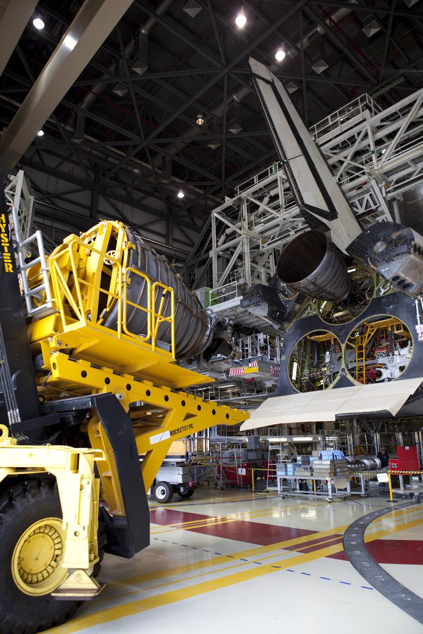 CAPE CANAVERAL, Fla. – At NASA’s Kennedy Space Center in Florida, the Hyster forklift arrives at Orbiter Processing Facility Bay 2 delivering replica shuttle main engine RSME number 3 for installation on space shuttle Endeavour. The work is part of Transition and Retirement of the remaining space shuttles, Endeavour and Atlantis. Endeavour is being prepared for public display at the California Science Center in Los Angeles. Its ferry flight to California is targeted for mid-September. Endeavour was the last space shuttle added to NASA’s orbiter fleet. Over the course of its 19-year career, Endeavour spent 299 days in space during 25 missions. For more information, visit http://www.nasa.gov/transition Photo credit: NASA/ Dimitri Gerondidakis