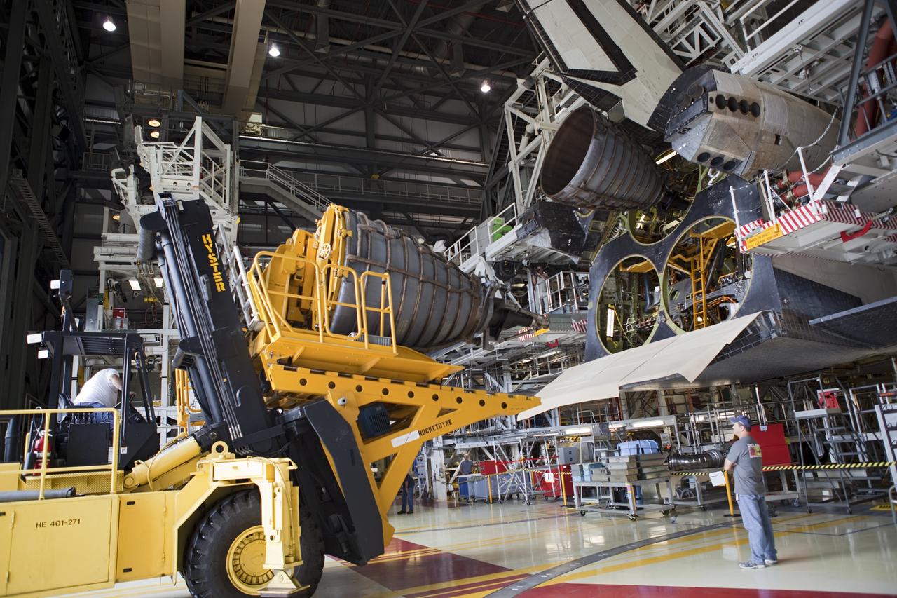 CAPE CANAVERAL, Fla. – Technicians keep a close watch as the Hyster forklift arrives at Orbiter Processing Facility Bay 2 at NASA’s Kennedy Space Center in Florida. Replica shuttle main engine RSME number 3 is being delivered for installation on space shuttle Endeavour. The work is part of Transition and Retirement of the remaining space shuttles, Endeavour and Atlantis. Endeavour is being prepared for public display at the California Science Center in Los Angeles. Its ferry flight to California is targeted for mid-September. Endeavour was the last space shuttle added to NASA’s orbiter fleet. Over the course of its 19-year career, Endeavour spent 299 days in space during 25 missions. For more information, visit http://www.nasa.gov/transition Photo credit: NASA/ Dimitri Gerondidakis
