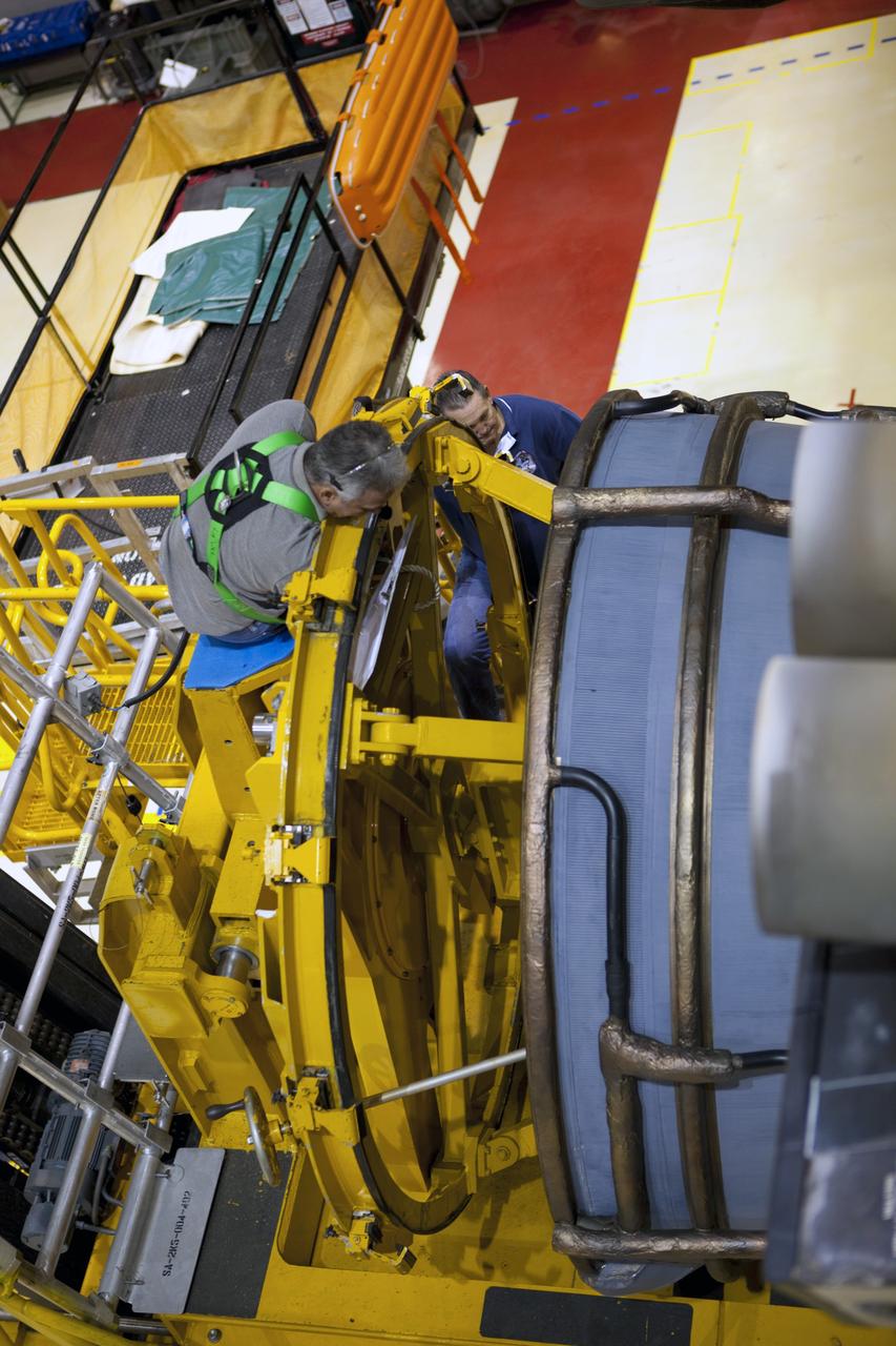 CAPE CANAVERAL, Fla. – In Orbiter Processing Facility Bay 2 at NASA’s Kennedy Space Center in Florida, technicians use the Hyster forklift to install replica shuttle main engine RSME number 3 on the space shuttle Endeavour. The work is part of Transition and Retirement of the remaining space shuttles, Endeavour and Atlantis. Endeavour is being prepared for public display at the California Science Center in Los Angeles. Its ferry flight to California is targeted for mid-September. Endeavour was the last space shuttle added to NASA’s orbiter fleet. Over the course of its 19-year career, Endeavour spent 299 days in space during 25 missions. For more information, visit http://www.nasa.gov/transition Photo credit: NASA/ Dimitri Gerondidakis