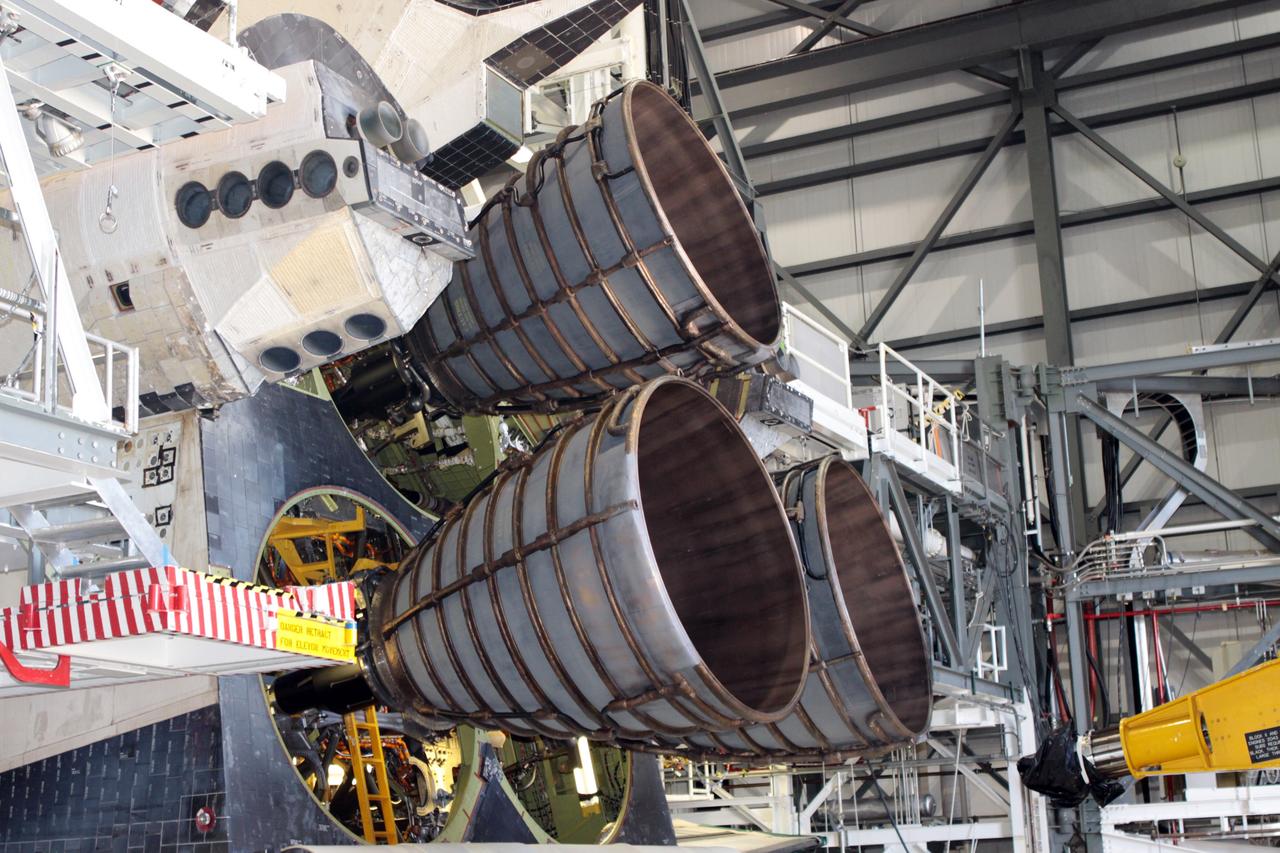 CAPE CANAVERAL, Fla. – Inside Orbiter Processing Facility-2 at NASA’s Kennedy Space Center in Florida, United Space Alliance technicians are installing replica shuttle main engine 2, or RSME 2, on space shuttle Endeavour. The orbiter is surrounded by work platforms allowing access to all areas of the spacecraft. The work is part of Transition and Retirement of the remaining space shuttles, Endeavour and Atlantis. Endeavour is being prepared for public display at the California Science Center in Los Angeles. Its ferry flight to California is targeted for mid-September. Endeavour was the last space shuttle added to NASA’s orbiter fleet. Over the course of its 19-year career, Endeavour spent 299 days in space during 25 missions. For more information, visit http://www.nasa.gov/shuttle. Photo credit: NASA/David Lee