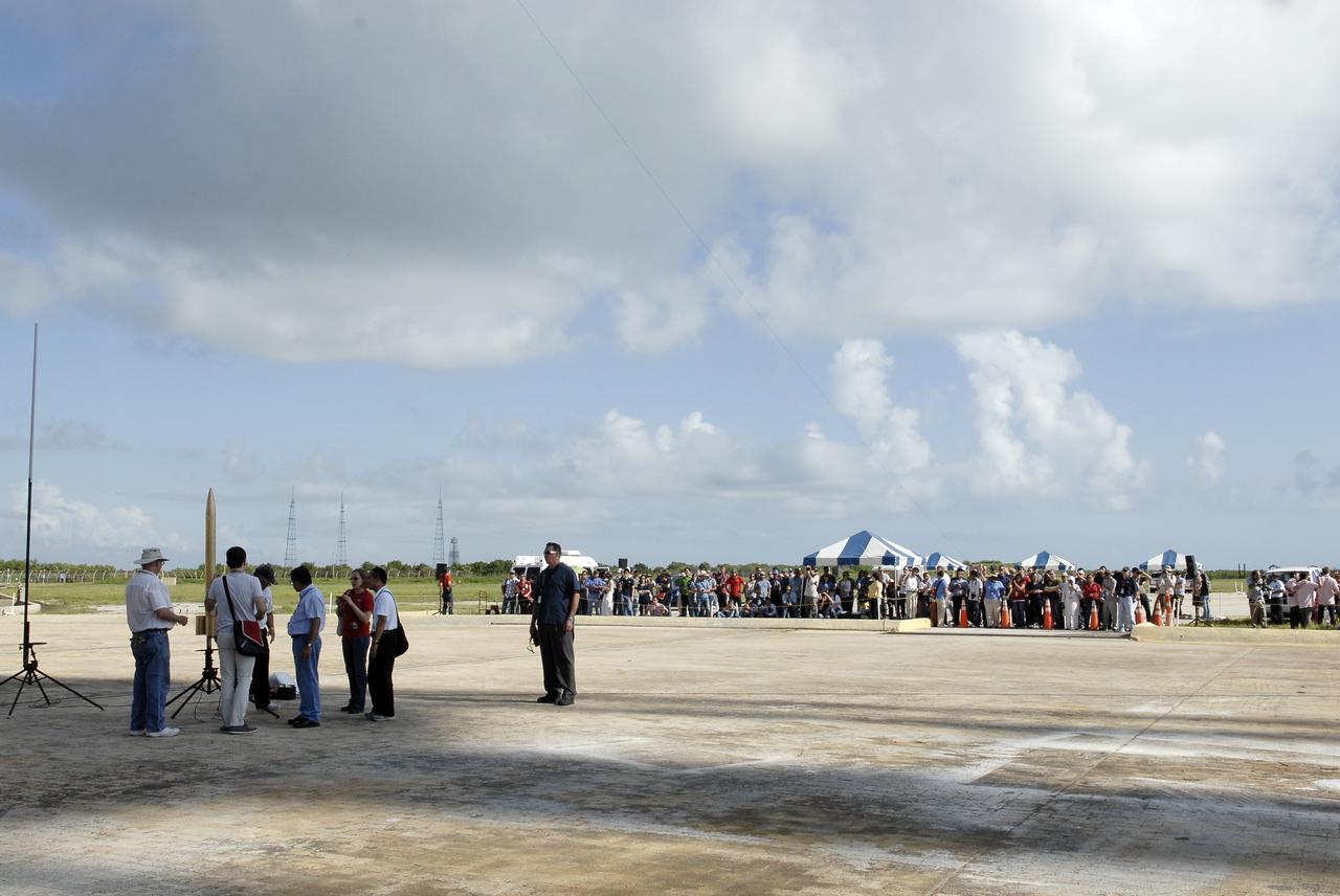 CAPE CANAVERAL, Fla. – Students of the International Space University stand with their model rocket during the rocket launch competition of the ISU's summer session. The competition was conducted at Launch Complex 39A at NASA's Kennedy Space Center in Florida, which co-hosted this year's ISU. Six teams designed and built large model rockets, each between three and five feet tall, and launched them from Launch Pad 39A, the starting point for Apollo missions to the moon and dozens of space shuttle flights. Each launch carried a raw egg, dubbed "eggstronauts" and had to recover it intact to be declared successful. Photo credit: NASA/Charisse Nahsser