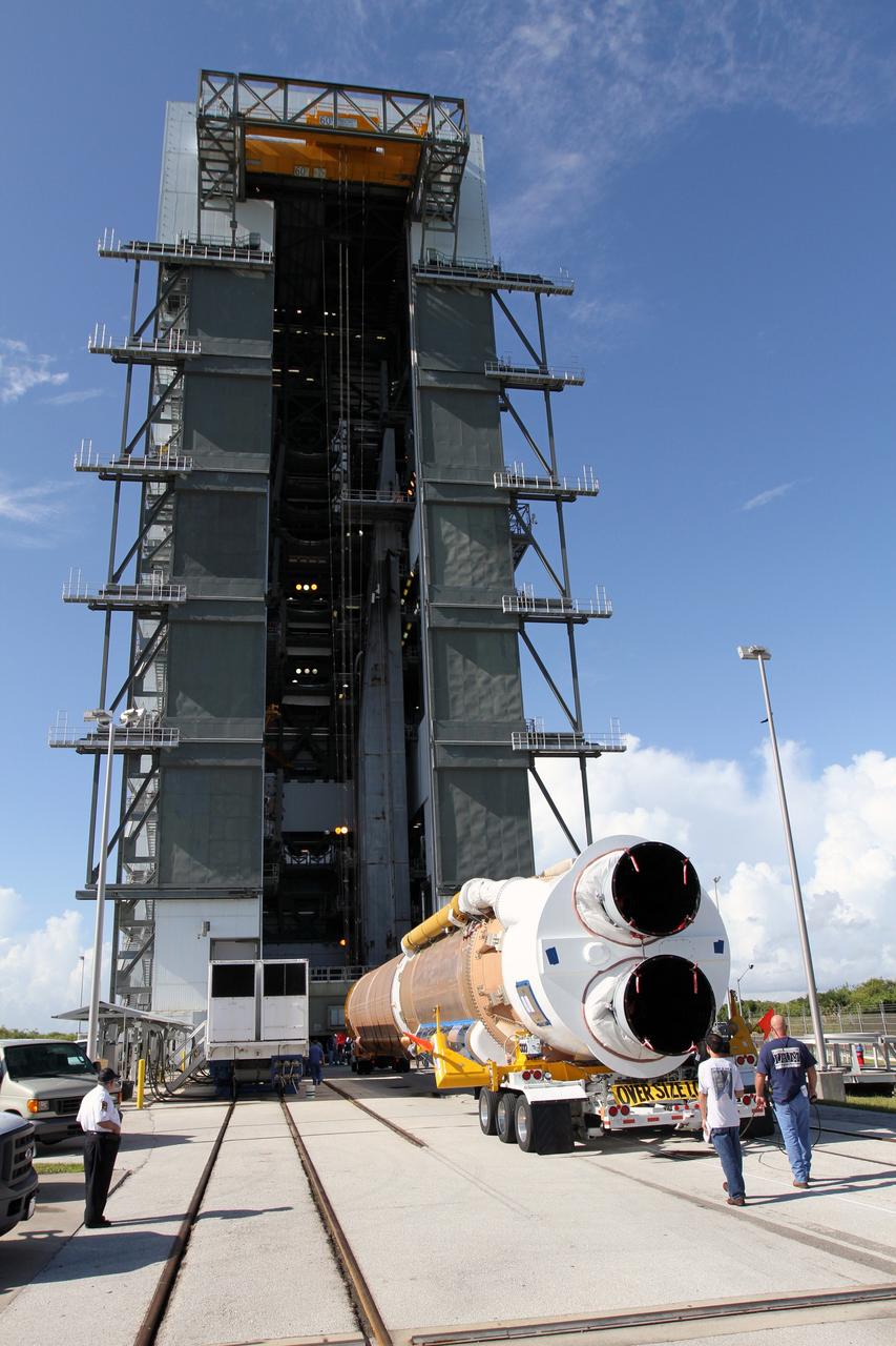 CAPE CANAVERAL, Fla. - The first stage of the United Launch Alliance Atlas V rocket arrives at Launch Complex 41 at Cape Canaveral Air Force Station in Florida for the Radiation Belt Storm Probes, or RBSP, mission.    NASA’s RBSP mission will help us understand the sun’s influence on Earth and near-Earth space by studying the Earth’s radiation belts on various scales of space and time. RBSP will begin its mission of exploration of Earth’s Van Allen radiation belts and the extremes of space weather after its launch aboard an Atlas V rocket. Launch is targeted for Aug. 23. For more information, visit http://www.nasa.gov/rbsp. Photo credit: NASA/Cory Huston