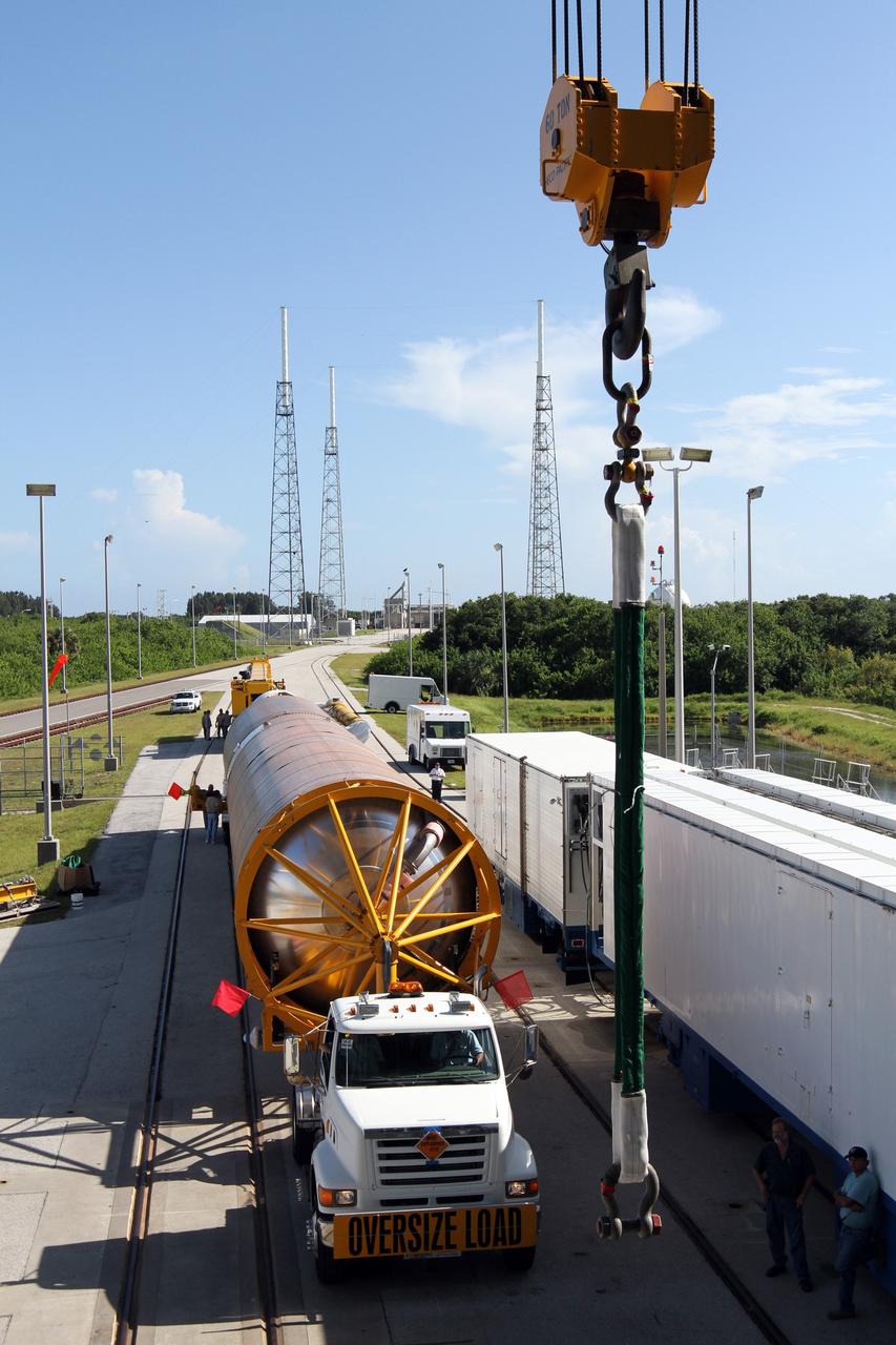 CAPE CANAVERAL, Fla. - The first stage of the United Launch Alliance Atlas V rocket arrives at Launch Complex 41 at Cape Canaveral Air Force Station in Florida for the Radiation Belt Storm Probes, or RBSP, mission.    NASA’s RBSP mission will help us understand the sun’s influence on Earth and near-Earth space by studying the Earth’s radiation belts on various scales of space and time. RBSP will begin its mission of exploration of Earth’s Van Allen radiation belts and the extremes of space weather after its launch aboard an Atlas V rocket. Launch is targeted for Aug. 23. For more information, visit http://www.nasa.gov/rbsp. Photo credit: NASA/Cory Huston