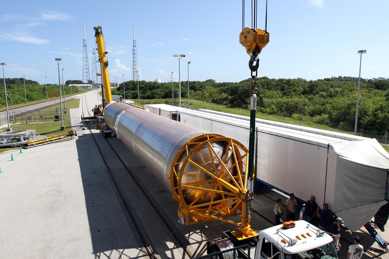 CAPE CANAVERAL, Fla. - The first stage of the United Launch Alliance Atlas V rocket arrives at Launch Complex 41 at Cape Canaveral Air Force Station in Florida for the Radiation Belt Storm Probes, or RBSP, mission. NASA’s RBSP mission will help us understand the sun’s influence on Earth and near-Earth space by studying the Earth’s radiation belts on various scales of space and time. RBSP will begin its mission of exploration of Earth’s Van Allen radiation belts and the extremes of space weather after its launch aboard an Atlas V rocket. Launch is targeted for Aug. 23. For more information, visit http://www.nasa.gov/rbsp. Photo credit: NASA/Cory Huston