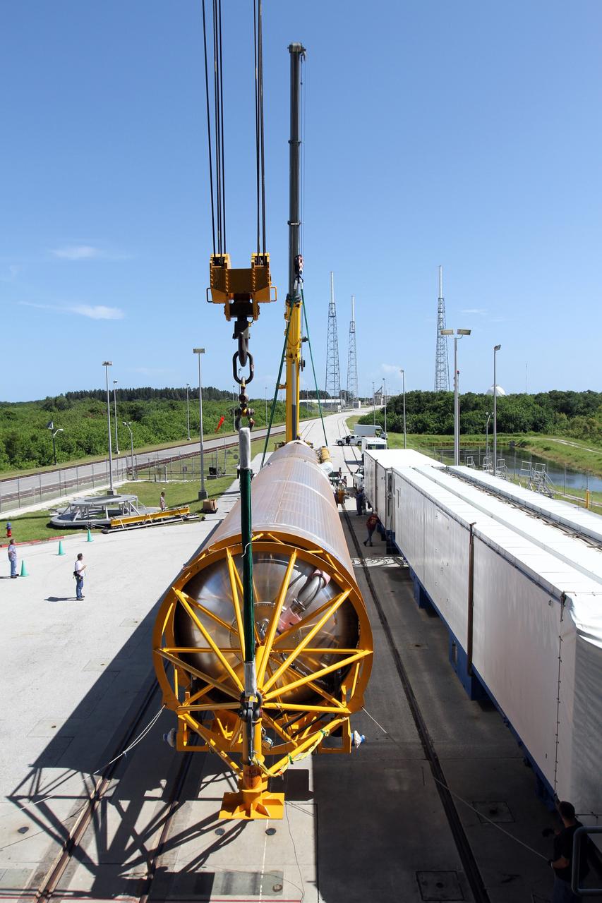 CAPE CANAVERAL, Fla. - At Launch Complex 41 at Cape Canaveral Air Force Station in Florida, preparations are underway to lift the first stage of the United Launch Alliance Atlas V rocket into the vertical position. The Atlas V is being prepared for the Radiation Belt Storm Probes, or RBSP, mission. NASA’s RBSP mission will help us understand the sun’s influence on Earth and near-Earth space by studying the Earth’s radiation belts on various scales of space and time. RBSP will begin its mission of exploration of Earth’s Van Allen radiation belts and the extremes of space weather after its launch aboard an Atlas V rocket. Launch is targeted for Aug. 23. For more information, visit http://www.nasa.gov/rbsp. Photo credit: NASA/Cory Huston