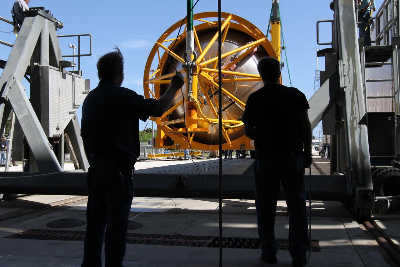 CAPE CANAVERAL, Fla. - At Launch Complex 41 at Cape Canaveral Air Force Station in Florida, preparations are underway to lift the first stage of the United Launch Alliance Atlas V rocket into the vertical position. The Atlas V is being prepared for the Radiation Belt Storm Probes, or RBSP, mission. NASA’s RBSP mission will help us understand the sun’s influence on Earth and near-Earth space by studying the Earth’s radiation belts on various scales of space and time. RBSP will begin its mission of exploration of Earth’s Van Allen radiation belts and the extremes of space weather after its launch aboard an Atlas V rocket. Launch is targeted for Aug. 23. For more information, visit http://www.nasa.gov/rbsp. Photo credit: NASA/Cory Huston