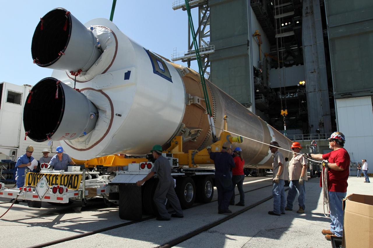 CAPE CANAVERAL, Fla. - At Launch Complex 41 at Cape Canaveral Air Force Station in Florida, preparations are underway to lift the first stage of the United Launch Alliance Atlas V rocket into the vertical position. The Atlas V is being prepared for the Radiation Belt Storm Probes, or RBSP, mission.    NASA’s RBSP mission will help us understand the sun’s influence on Earth and near-Earth space by studying the Earth’s radiation belts on various scales of space and time. RBSP will begin its mission of exploration of Earth’s Van Allen radiation belts and the extremes of space weather after its launch aboard an Atlas V rocket. Launch is targeted for Aug. 23. For more information, visit http://www.nasa.gov/rbsp. Photo credit: NASA/Cory Huston