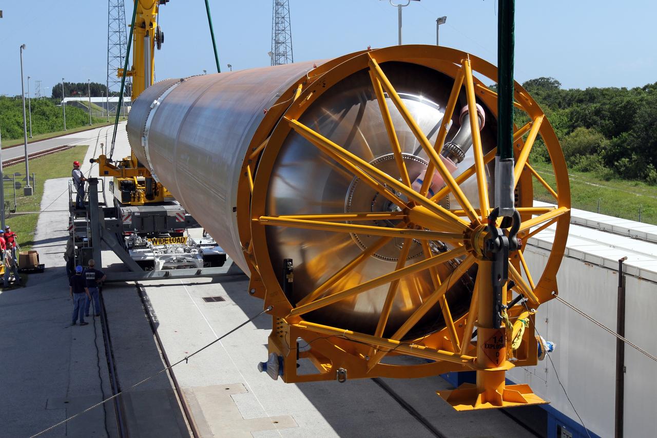 CAPE CANAVERAL, Fla. - At Launch Complex 41 at Cape Canaveral Air Force Station in Florida, a large crane begins to lift the first stage of the United Launch Alliance Atlas V rocket into the vertical position. The Atlas V is being prepared for the Radiation Belt Storm Probes, or RBSP, mission.    NASA’s RBSP mission will help us understand the sun’s influence on Earth and near-Earth space by studying the Earth’s radiation belts on various scales of space and time. RBSP will begin its mission of exploration of Earth’s Van Allen radiation belts and the extremes of space weather after its launch aboard an Atlas V rocket. Launch is targeted for Aug. 23. For more information, visit http://www.nasa.gov/rbsp. Photo credit: NASA/Cory Huston