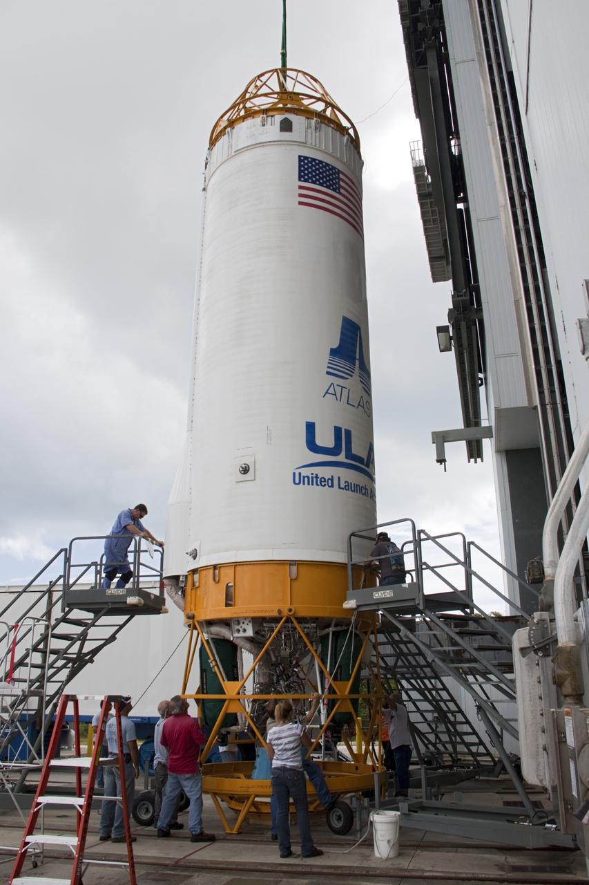 CAPE CANAVERAL, Fla. – At Space Launch Complex 41 at Cape Canaveral Air Force Station, Fla., United Launch Alliance technicians support the lifting operation as the Centaur stage is prepared for mating with the Atlas V rocket, which will launch the Radiation Belt Storm Probes, or RBSP, spacecraft. NASA’s RBSP mission will help us understand the sun’s influence on Earth and near-Earth space by studying the Earth’s radiation belts on various scales of space and time. RBSP will begin its mission of exploration of Earth’s Van Allen radiation belts and the extremes of space weather after its liftoff aboard a United Launch Alliance Atlas V from Cape Canaveral. Liftoff is targeted for Aug. 23, 2012. For more information, visit http://www.nasa.gov/rbsp. Photo credit: NASA/Jim Grossmann