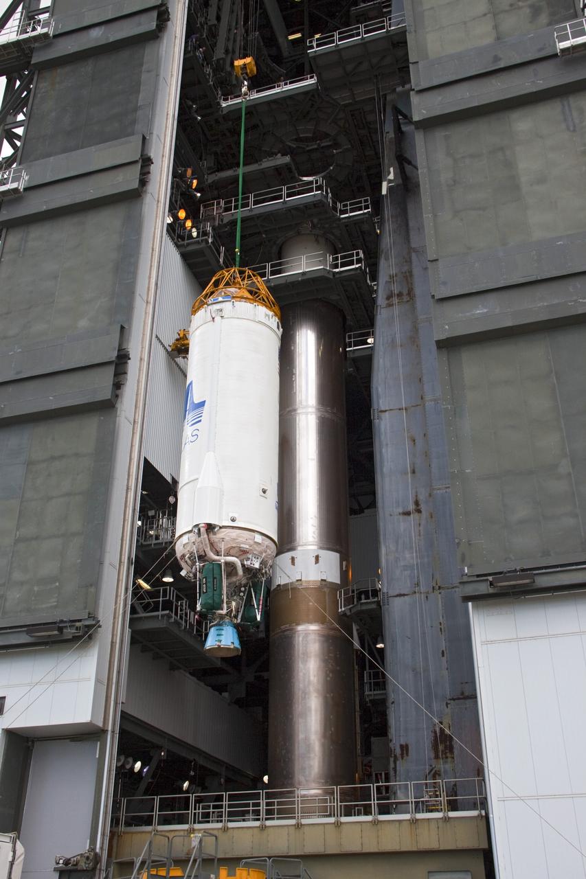 CAPE CANAVERAL, Fla. – At Space Launch Complex 41 at Cape Canaveral Air Force Station, Fla., the Centaur stage is being lifted for mating with the Atlas V rocket, which will launch the Radiation Belt Storm Probes, or RBSP, spacecraft. NASA’s RBSP mission will help us understand the sun’s influence on Earth and near-Earth space by studying the Earth’s radiation belts on various scales of space and time. RBSP will begin its mission of exploration of Earth’s Van Allen radiation belts and the extremes of space weather after its liftoff aboard a United Launch Alliance Atlas V from Cape Canaveral. Liftoff is targeted for Aug. 23, 2012. For more information, visit http://www.nasa.gov/rbsp. Photo credit: NASA/Jim Grossmann