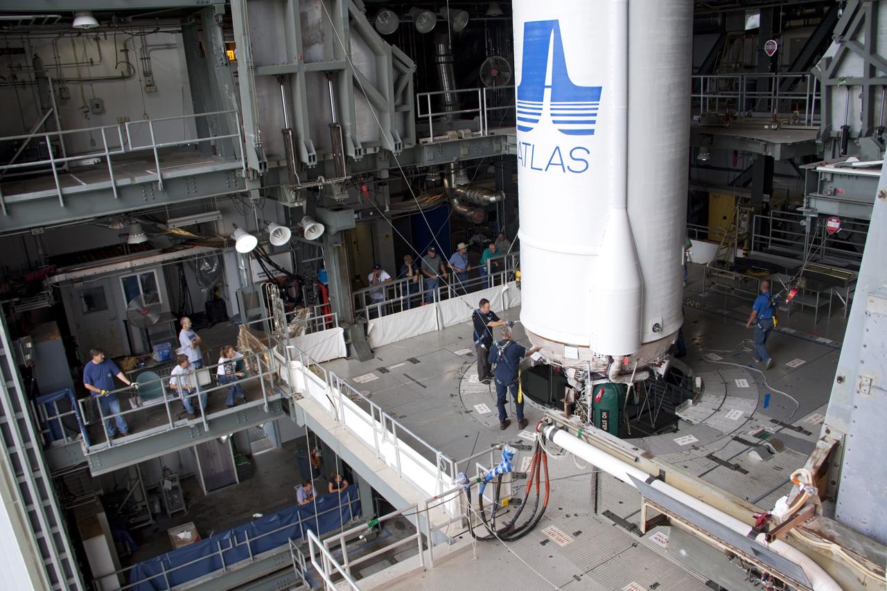 CAPE CANAVERAL, Fla. – At Space Launch Complex 41 at Cape Canaveral Air Force Station, Fla., United Launch Alliance technicians mate the Centaur stage with the Atlas V rocket, which will launch the Radiation Belt Storm Probes, or RBSP, spacecraft. NASA’s RBSP mission will help us understand the sun’s influence on Earth and near-Earth space by studying the Earth’s radiation belts on various scales of space and time. RBSP will begin its mission of exploration of Earth’s Van Allen radiation belts and the extremes of space weather after its liftoff aboard a United Launch Alliance Atlas V from Cape Canaveral. Liftoff is targeted for Aug. 23, 2012. For more information, visit http://www.nasa.gov/rbsp. Photo credit: NASA/Jim Grossmann