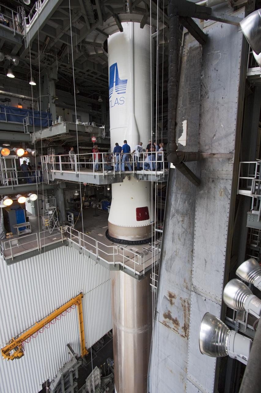 CAPE CANAVERAL, Fla. – At Space Launch Complex 41 at Cape Canaveral Air Force Station, Fla., United Launch Alliance technicians mate the Centaur stage with the Atlas V rocket, which will launch the Radiation Belt Storm Probes, or RBSP, spacecraft. NASA’s RBSP mission will help us understand the sun’s influence on Earth and near-Earth space by studying the Earth’s radiation belts on various scales of space and time. RBSP will begin its mission of exploration of Earth’s Van Allen radiation belts and the extremes of space weather after its liftoff aboard a United Launch Alliance Atlas V from Cape Canaveral. Liftoff is targeted for Aug. 23, 2012. For more information, visit http://www.nasa.gov/rbsp. Photo credit: NASA/Jim Grossmann