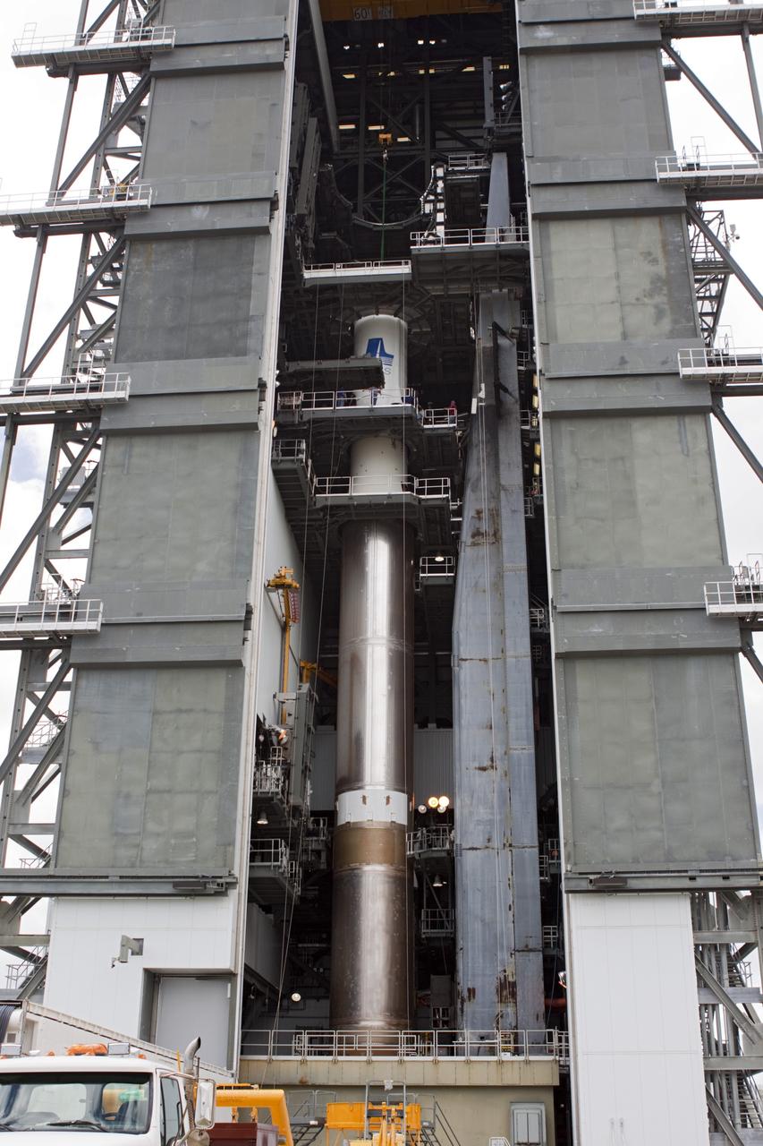 CAPE CANAVERAL, Fla. – At Space Launch Complex 41 at Cape Canaveral Air Force Station, Fla., the Centaur stage has just been mated with the Atlas V rocket, which will launch the Radiation Belt Storm Probes, or RBSP, spacecraft. NASA’s RBSP mission will help us understand the sun’s influence on Earth and near-Earth space by studying the Earth’s radiation belts on various scales of space and time. RBSP will begin its mission of exploration of Earth’s Van Allen radiation belts and the extremes of space weather after its liftoff aboard a United Launch Alliance Atlas V from Cape Canaveral. Liftoff is targeted for Aug. 23, 2012. For more information, visit http://www.nasa.gov/rbsp. Photo credit: NASA/Jim Grossmann