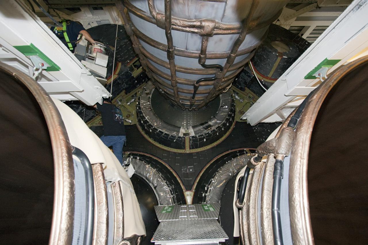 CAPE CANAVERAL, Fla. – In Orbiter Processing Facility Bay 2 at NASA’s Kennedy Space Center in Florida, heat shields are being installed around space shuttle Endeavour’s replica shuttle main engines.      The work is part of Transition and Retirement of the remaining space shuttles, Endeavour and Atlantis. Endeavour is being prepared for public display at the California Science Center in Los Angeles. Its ferry flight to California is targeted for mid-September. Endeavour was the last space shuttle added to NASA’s orbiter fleet. Over the course of its 19-year career, Endeavour spent 299 days in space during 25 missions. For more information, visit http://www.nasa.gov/transition Photo credit: NASA/ Jim Grossmann