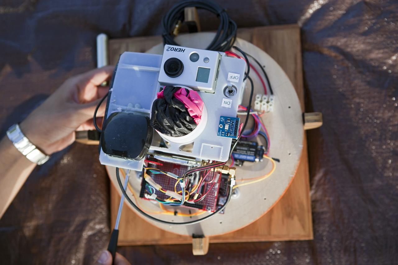 CAPE CANAVERAL, Fla. – The instrument package built by Rocket University participants for a high-altitude balloon flight. The test flight was used to evaluate the stability of an instrumented capsule as it fell to Earth before its parachute opened. Rocket University is a program of courses, workshops, labs and projects offered to engineering and research pros of all stripes to keep their skills fresh and broaden their experiences. Photo credit: NASA/Jim Grossmann