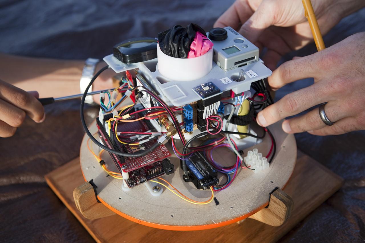 CAPE CANAVERAL, Fla. – The instrument package built by Rocket University participants for a high-altitude balloon flight. The test flight was used to evaluate the stability of an instrumented capsule as it fell to Earth before its parachute opened. Rocket University is a program of courses, workshops, labs and projects offered to engineering and research pros of all stripes to keep their skills fresh and broaden their experiences. Photo credit: NASA/Jim Grossmann